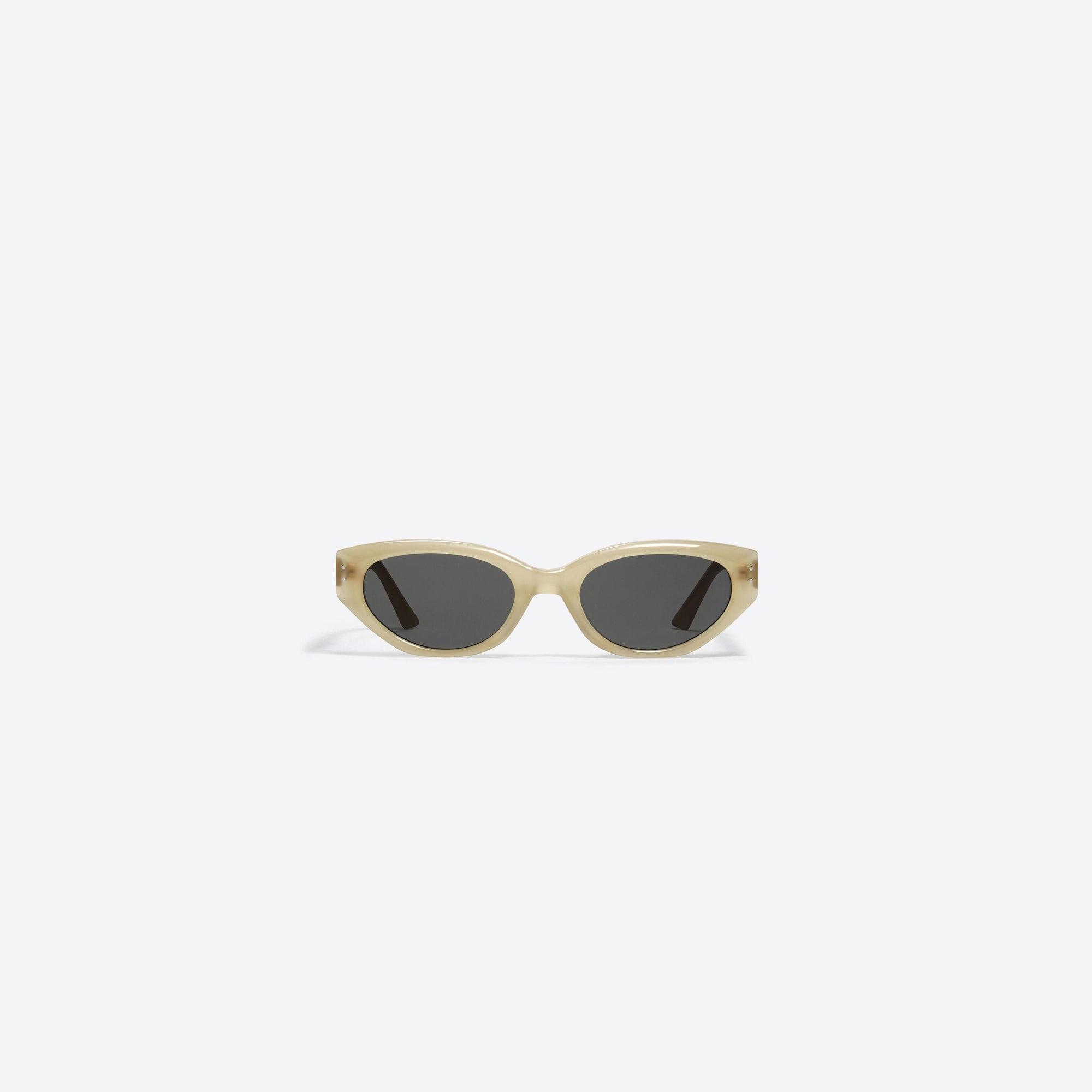 A front view of Gentle Monster Rococo IC1 Ivory Acetate framed Cat-eye sunglasses.