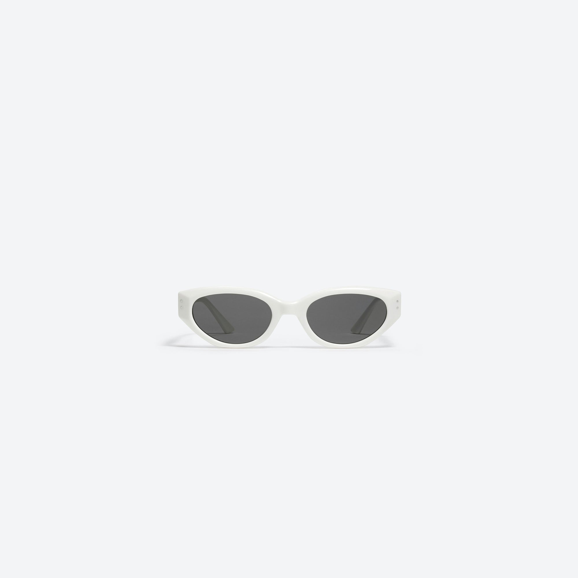 A front view of Gentle Monster Rococo W2 White Acetate framed Cat-eye sunglasses.