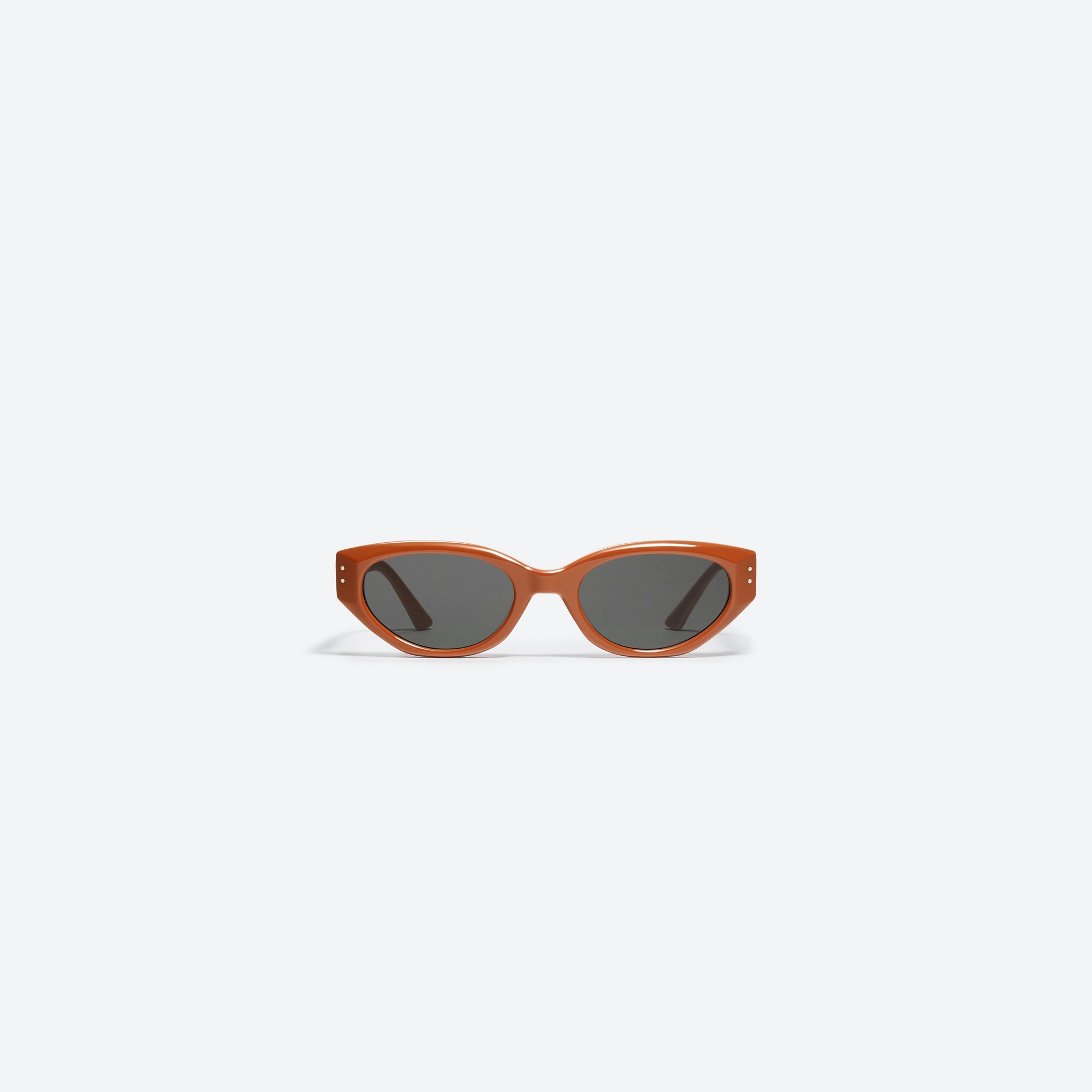 A front view of Gentle Monster Rococo OR2 Orange Acetate framed Cat-eye sunglasses.
