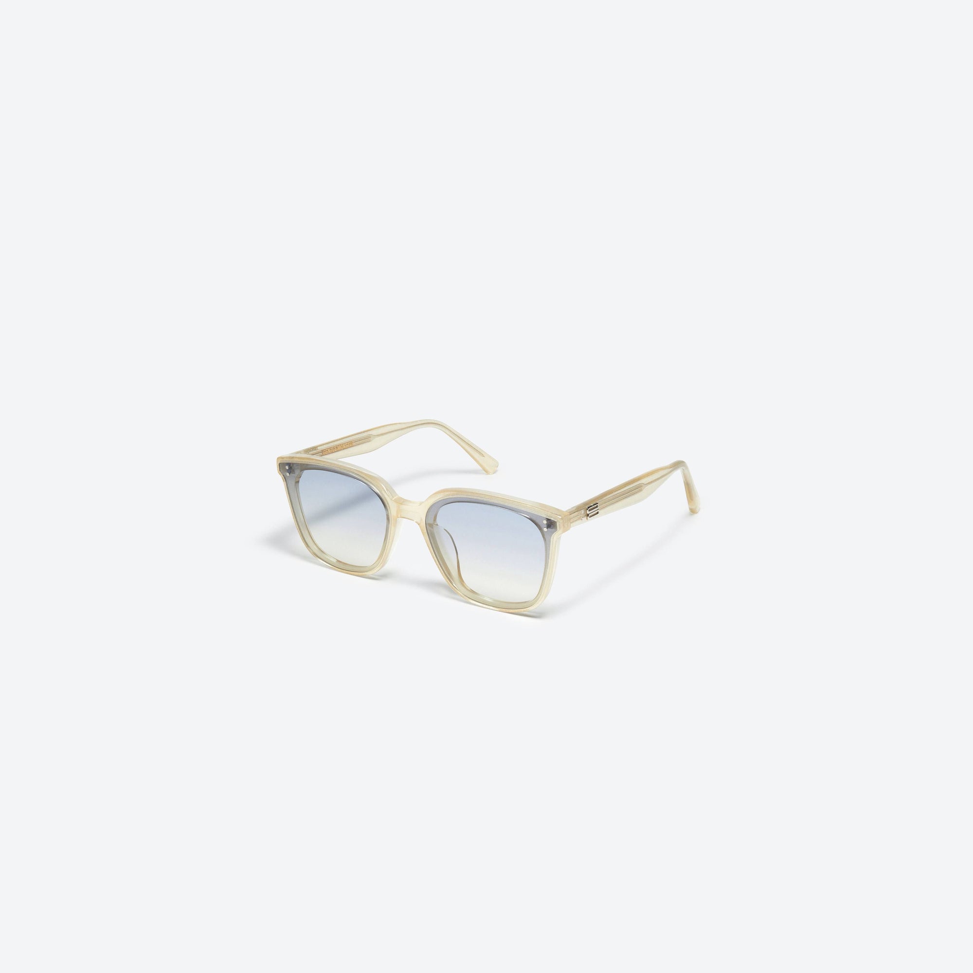 45-degree view of Gentle Monster Queen GDC1 Gold Acetate framed Square sunglasses.