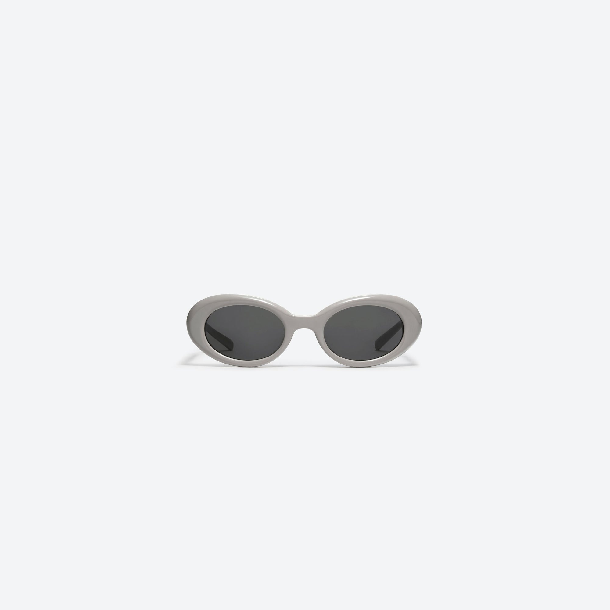 A front view of Gentle Monster Maison Margiela - MM005 G10 Gray Acetate framed Oval sunglasses.