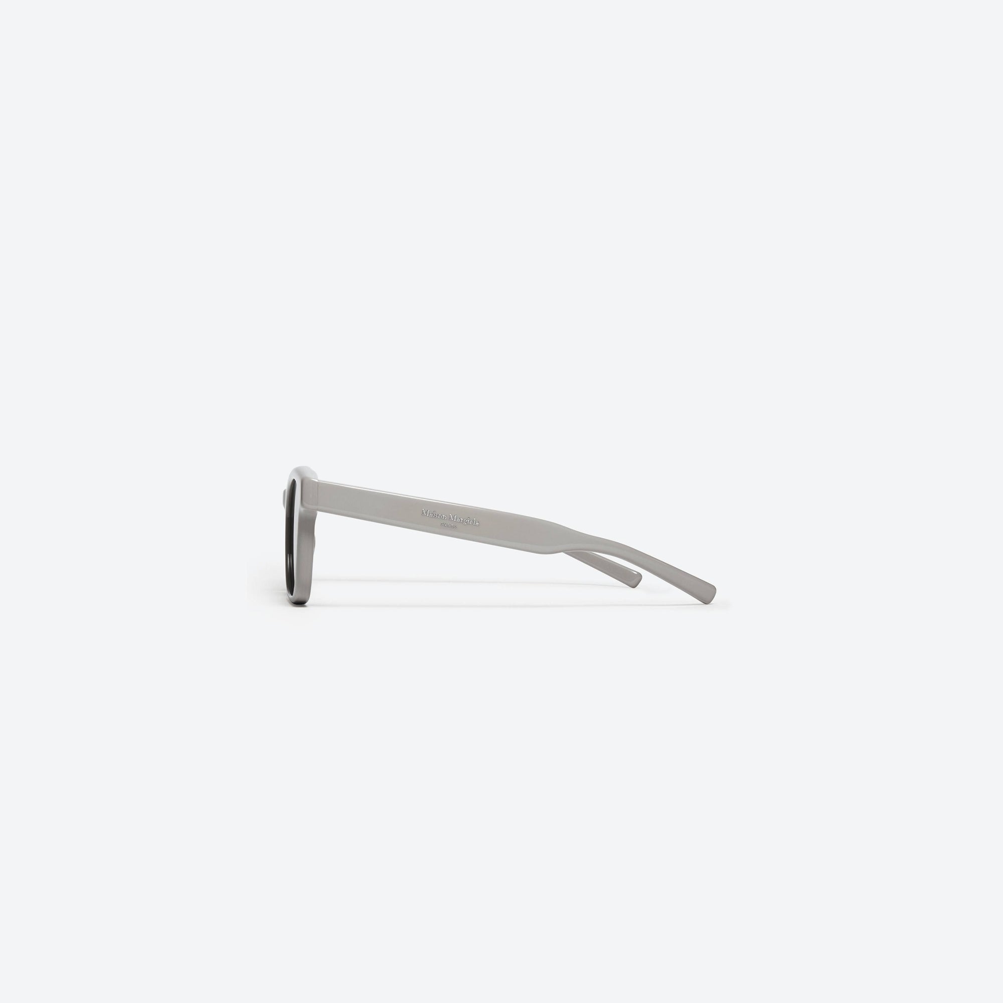 A detailed right view of Gentle Monster Maison Margiela - MM006 G10 Gray Acetate framed Square sunglasses.