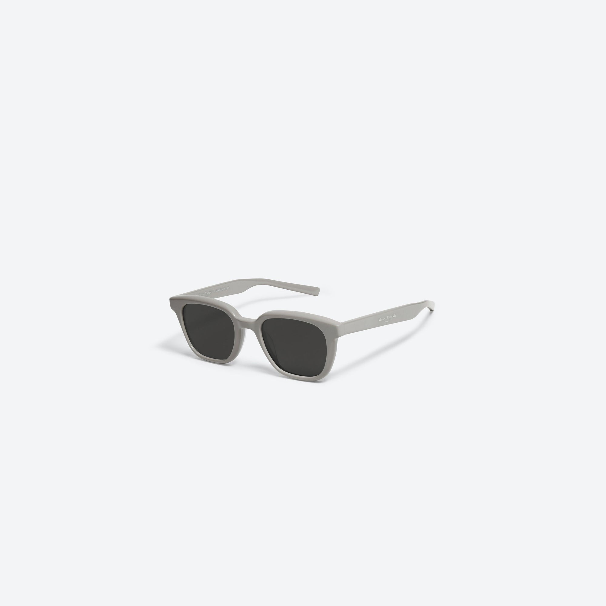 45-degree view of Gentle Monster Maison Margiela - MM007 G10 Gray Acetate framed Square sunglasses.