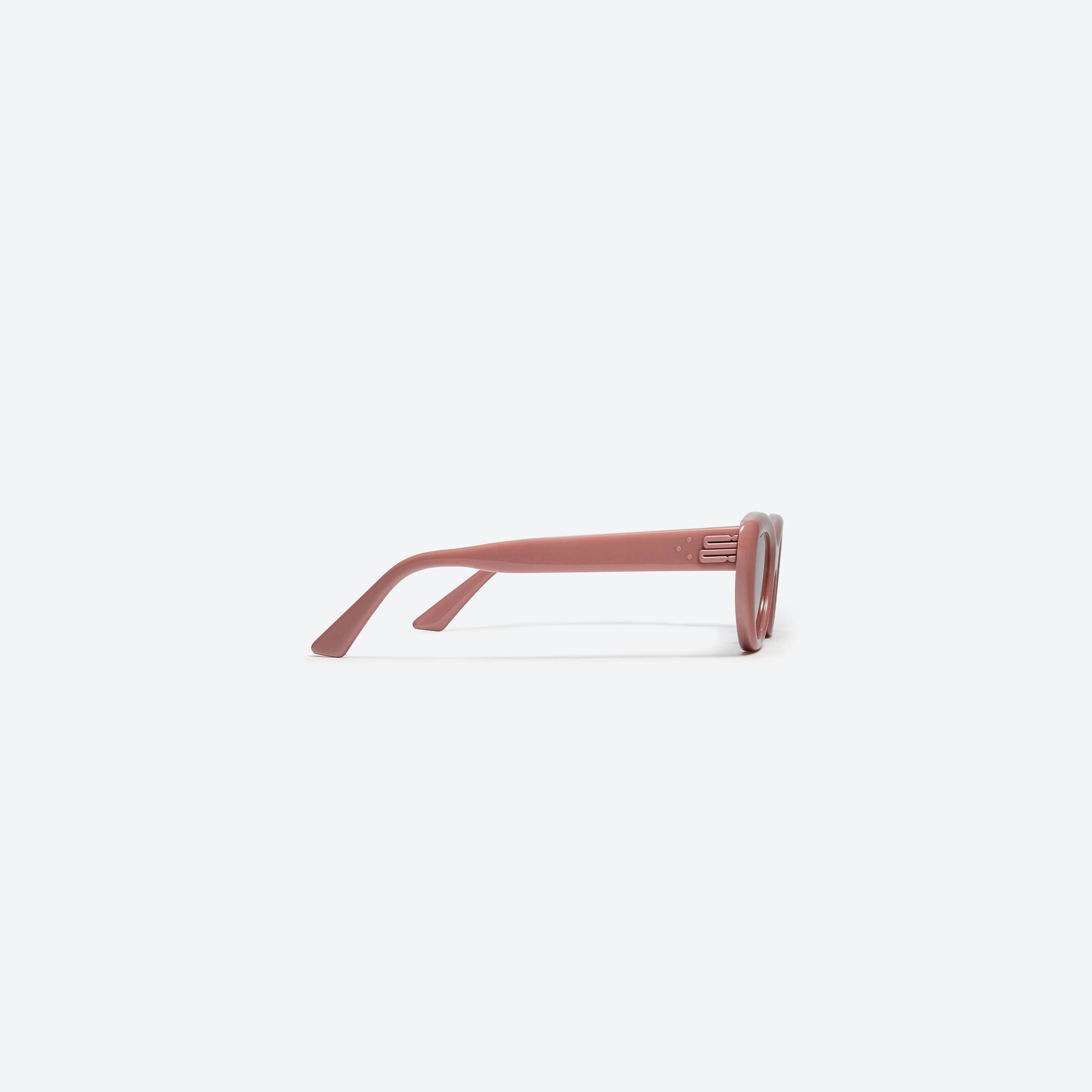 A detailed right view of Gentle Monster Conic P4 Pink Acetate framed Cat-eye sunglasses.