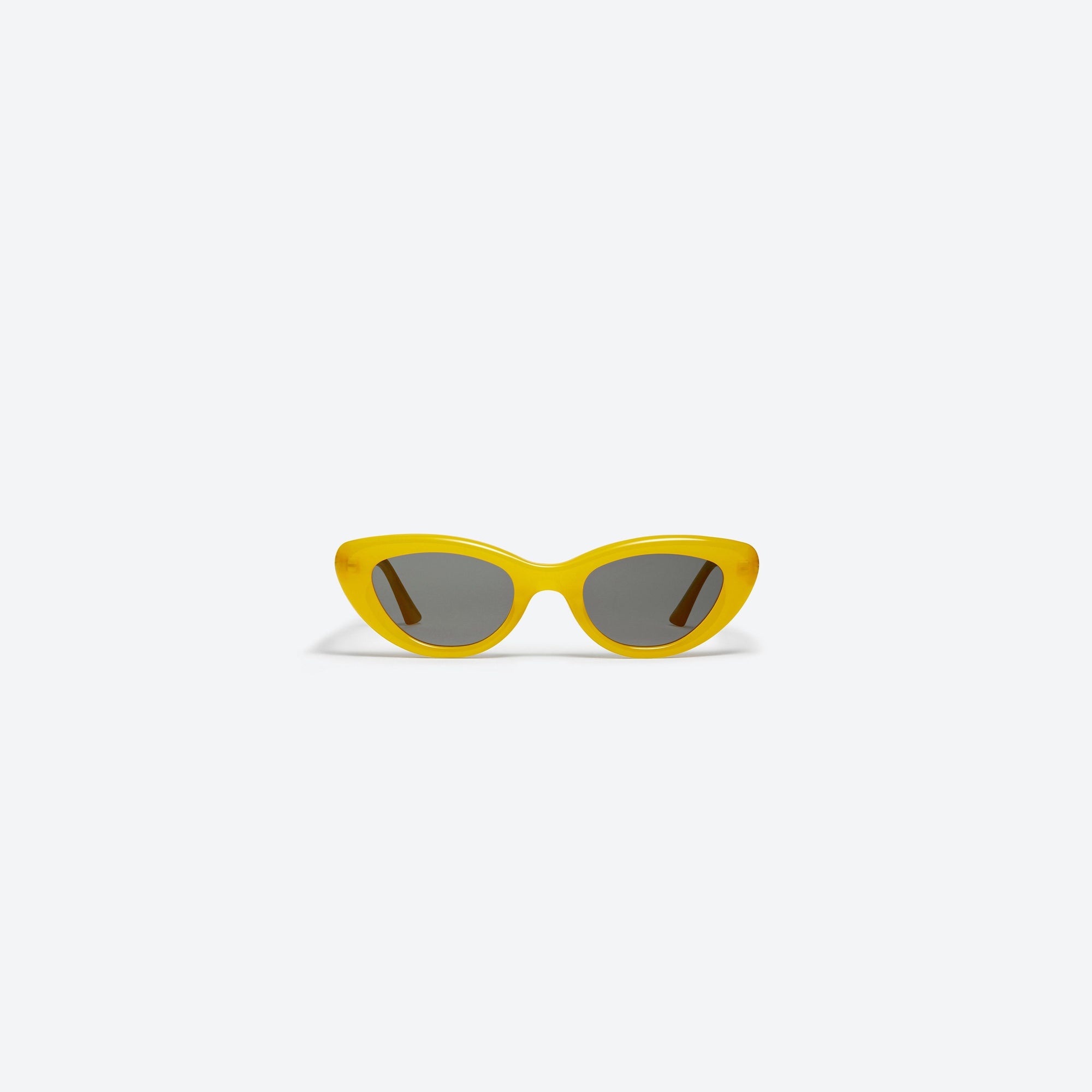 A front view of Gentle Monster Conic YC7 Yellow Acetate framed Cat-eye sunglasses.