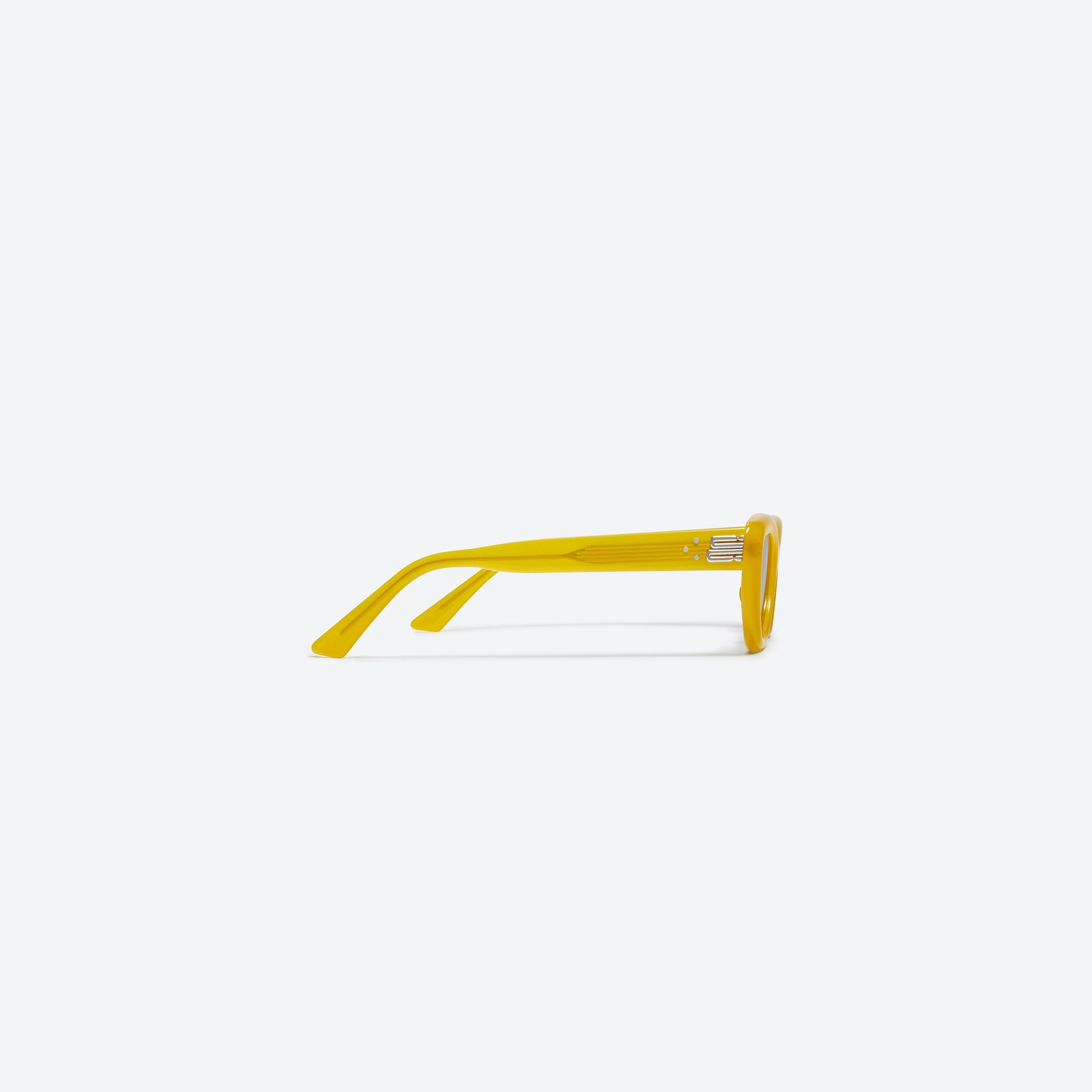 A detailed right view of Gentle Monster Conic YC7 Yellow Acetate framed Cat-eye sunglasses.