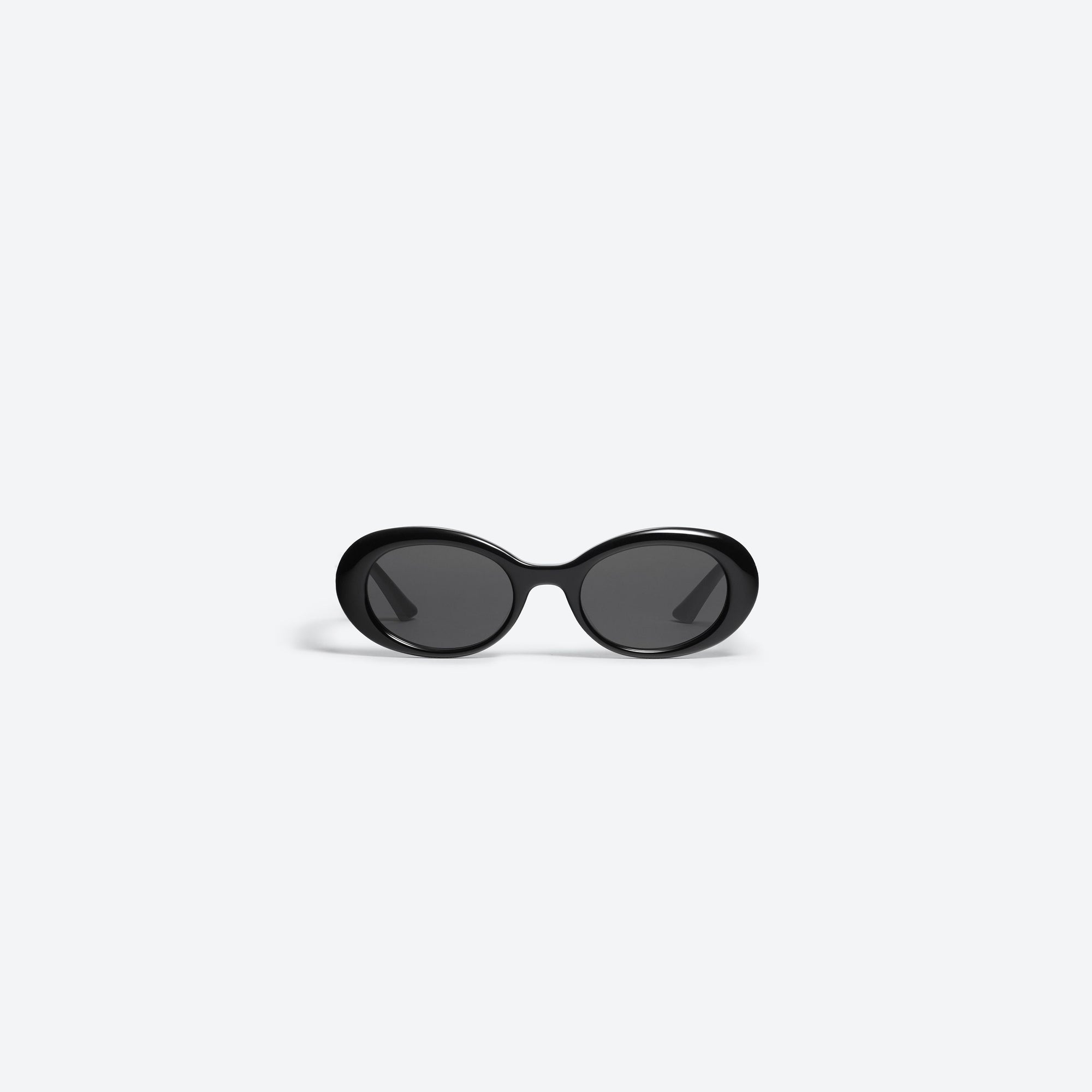 A front view of Gentle Monster KUN - 0003 01 Black Acetate framed Oval sunglasses.