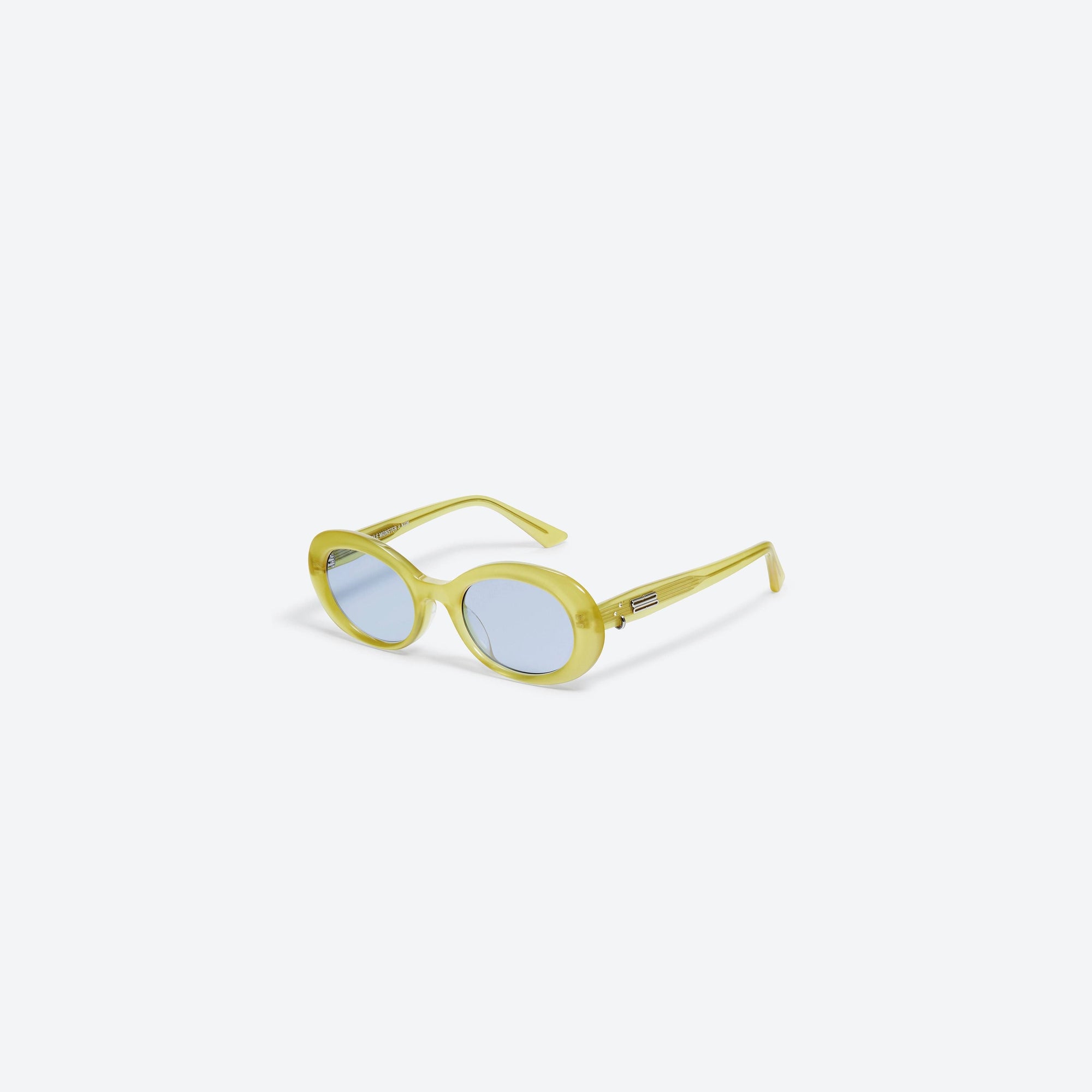 45-degree view of Gentle Monster KUN - 0003 OL3 Green Acetate framed Oval sunglasses.