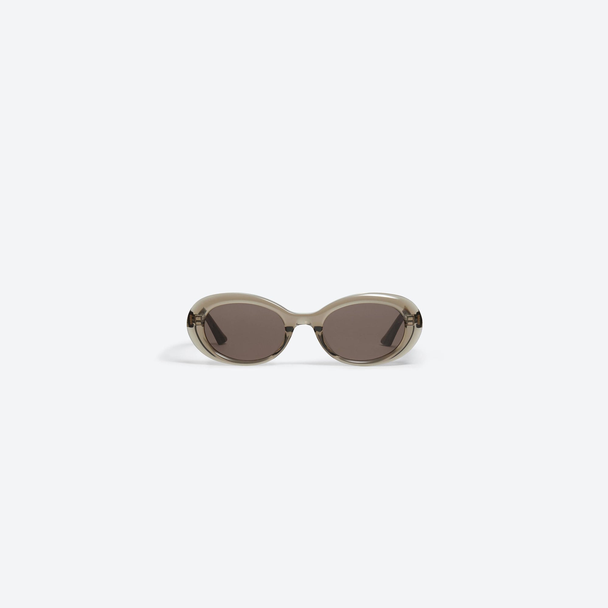 A front view of Gentle Monster KUN - 0003 BRC8 Brown Acetate framed Oval sunglasses.