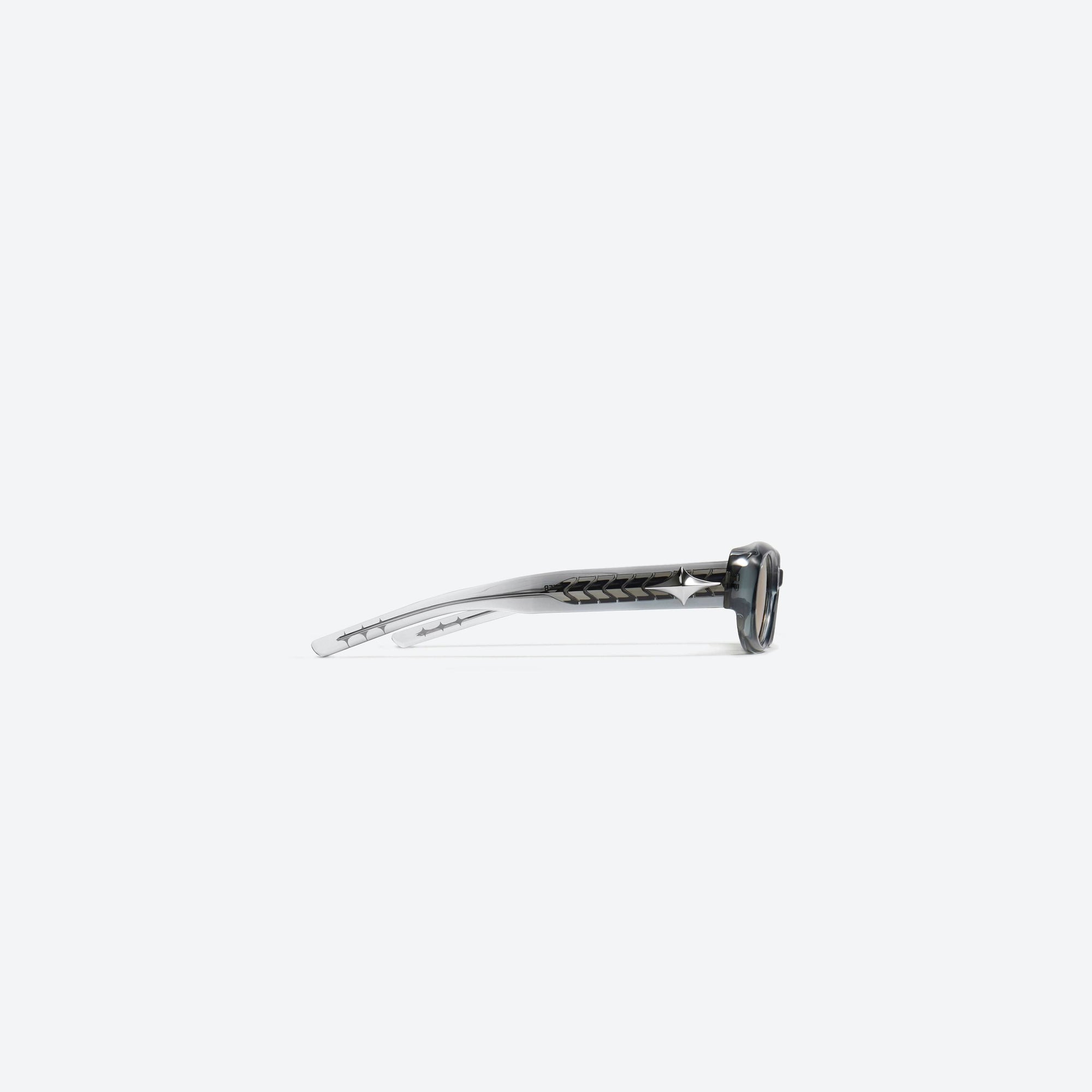 A detailed right view of Gentle Monster Orah GC5 Gray Acetate framed Oval sunglasses.