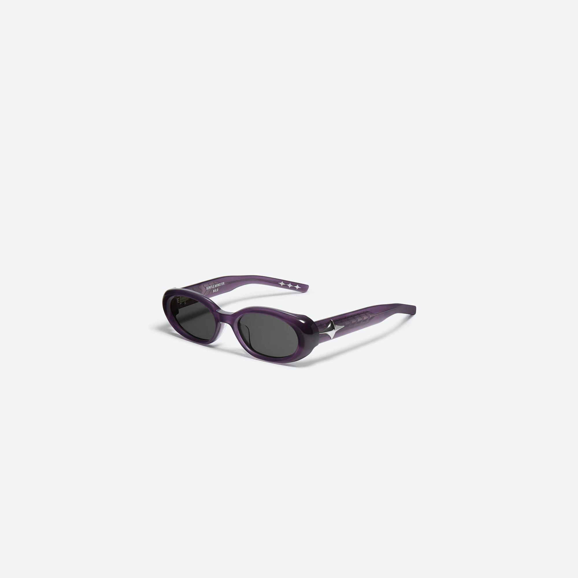 45-degree view of Gentle Monster Orah VC6 Purple Acetate framed Oval sunglasses.