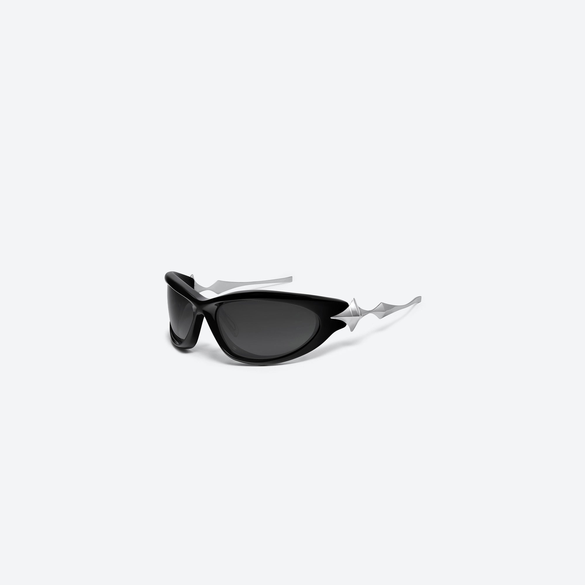 45-degree view of Gentle Monster Yyy 01 Black Mixed framed Wraparound sunglasses.