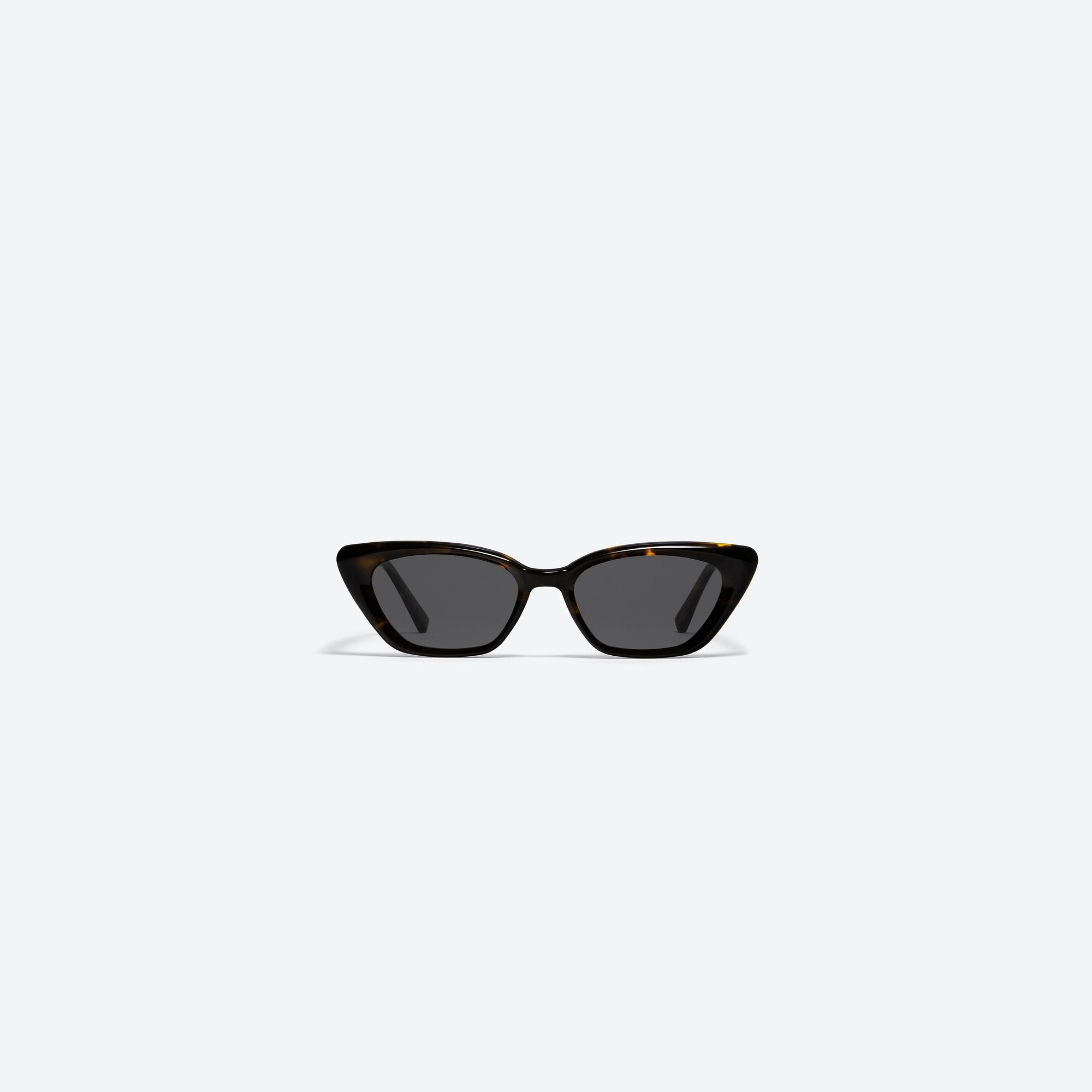 A front view of Gentle Monster Terra Cotta T1 Tortoise Acetate framed Cat-eye sunglasses.