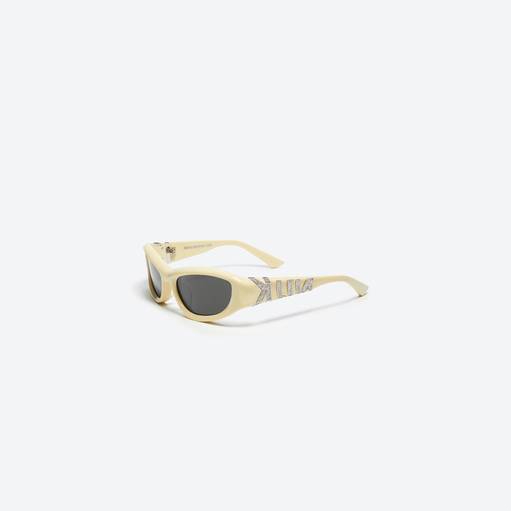 45-degree view of Gentle Monster KUN - 0002 Y5 Yellow Mixed framed Wraparound sunglasses.