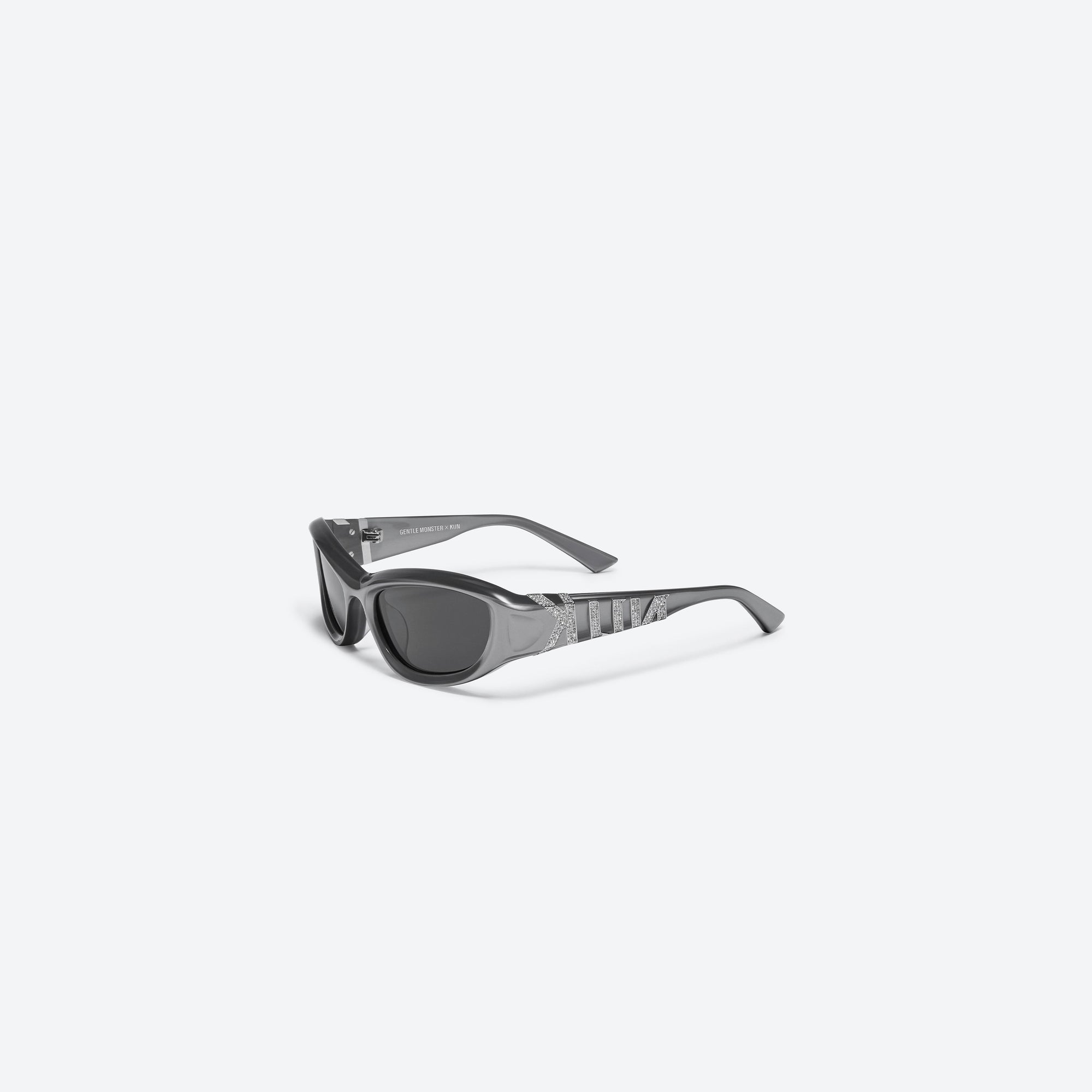 45-degree view of Gentle Monster KUN - 0002 G4 Gray Mixed framed Wraparound sunglasses.