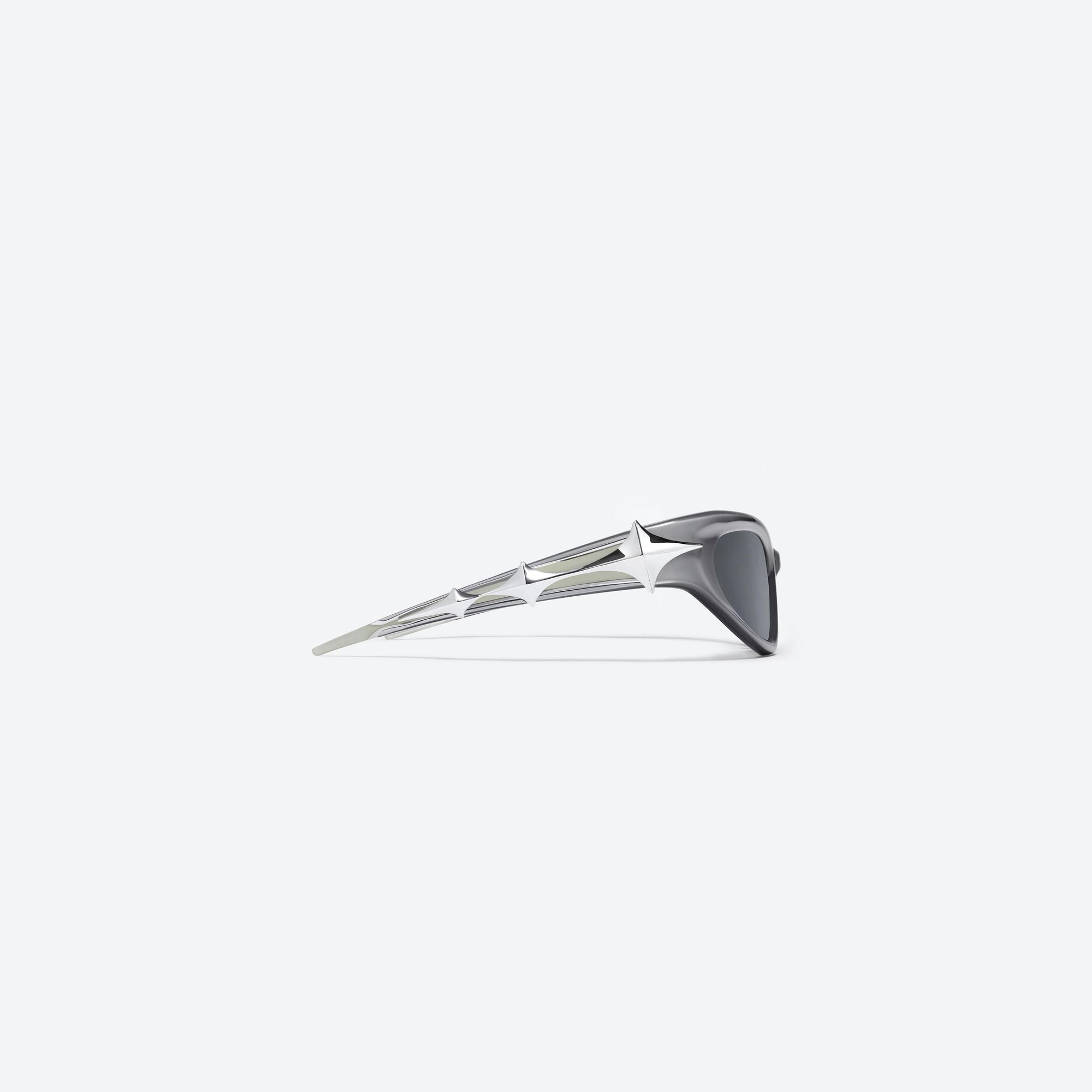 A detailed right view of Gentle Monster Paso G4 Similar Gray Acetate framed Wraparound sunglasses.