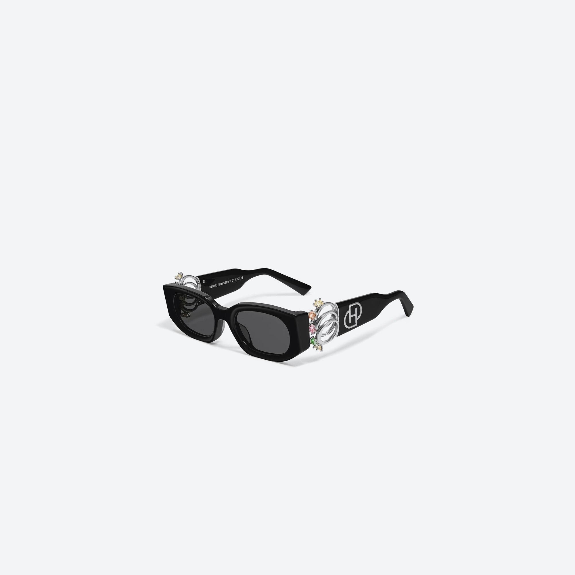 45-degree view of Gentle Monster D’heygere - Rings 01 Black Mixed framed Square sunglasses.