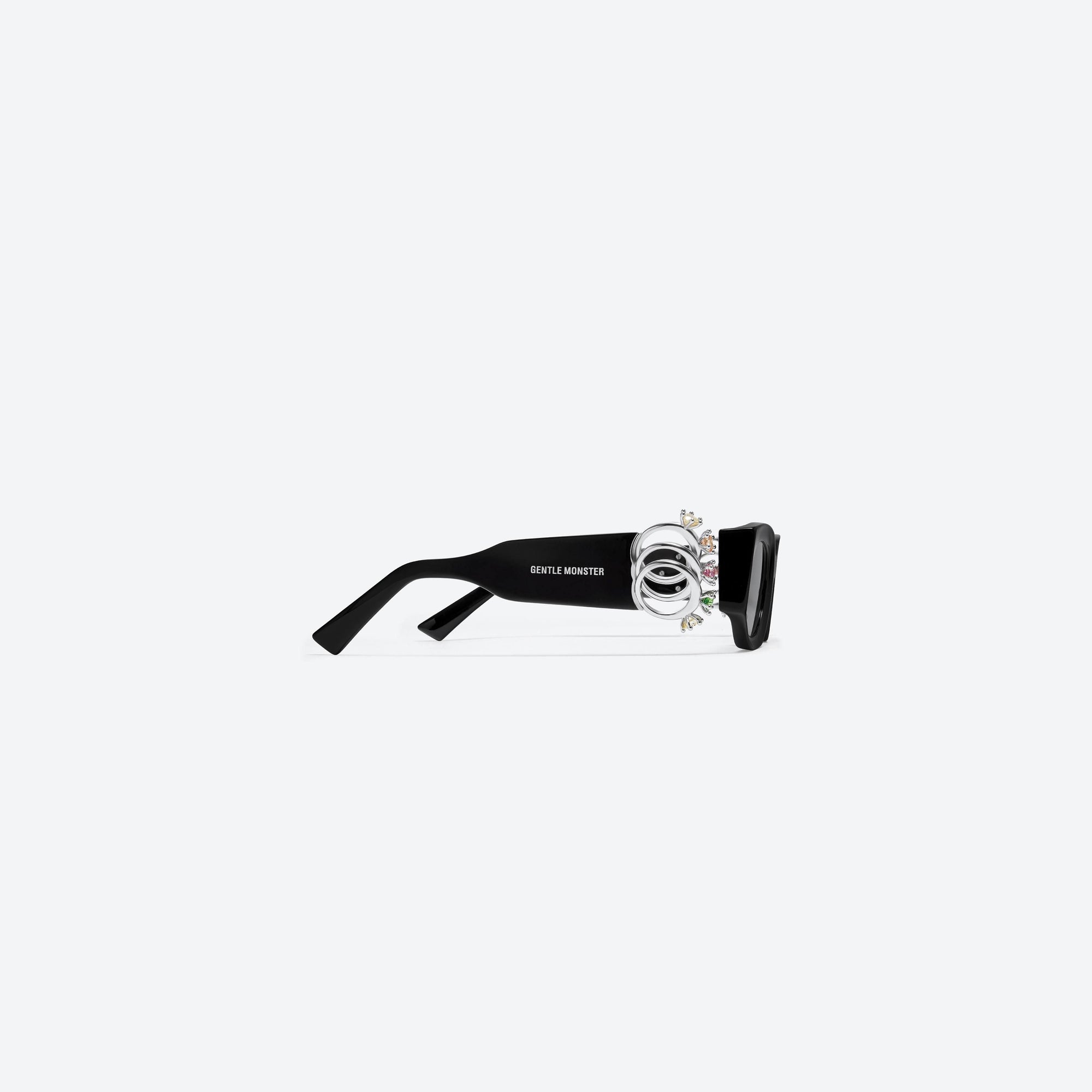 A detailed right view of Gentle Monster D’heygere - Rings 01 Black Mixed framed Square sunglasses.