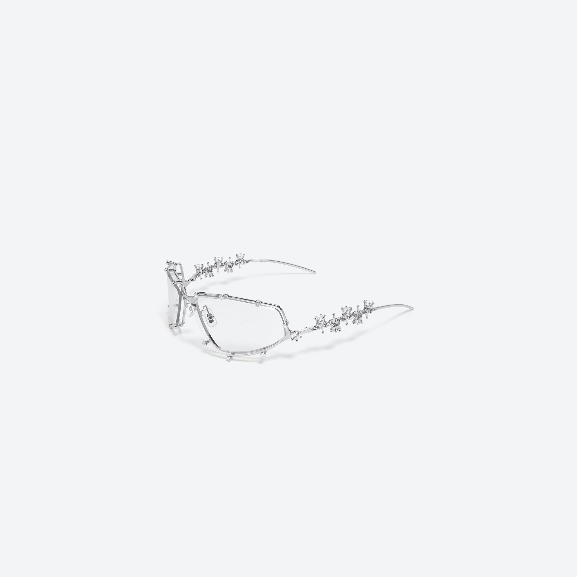 45-degree view of Gentle Monster D’heygere - Tiara 02 Silver Metal framed Wraparound sunglasses.