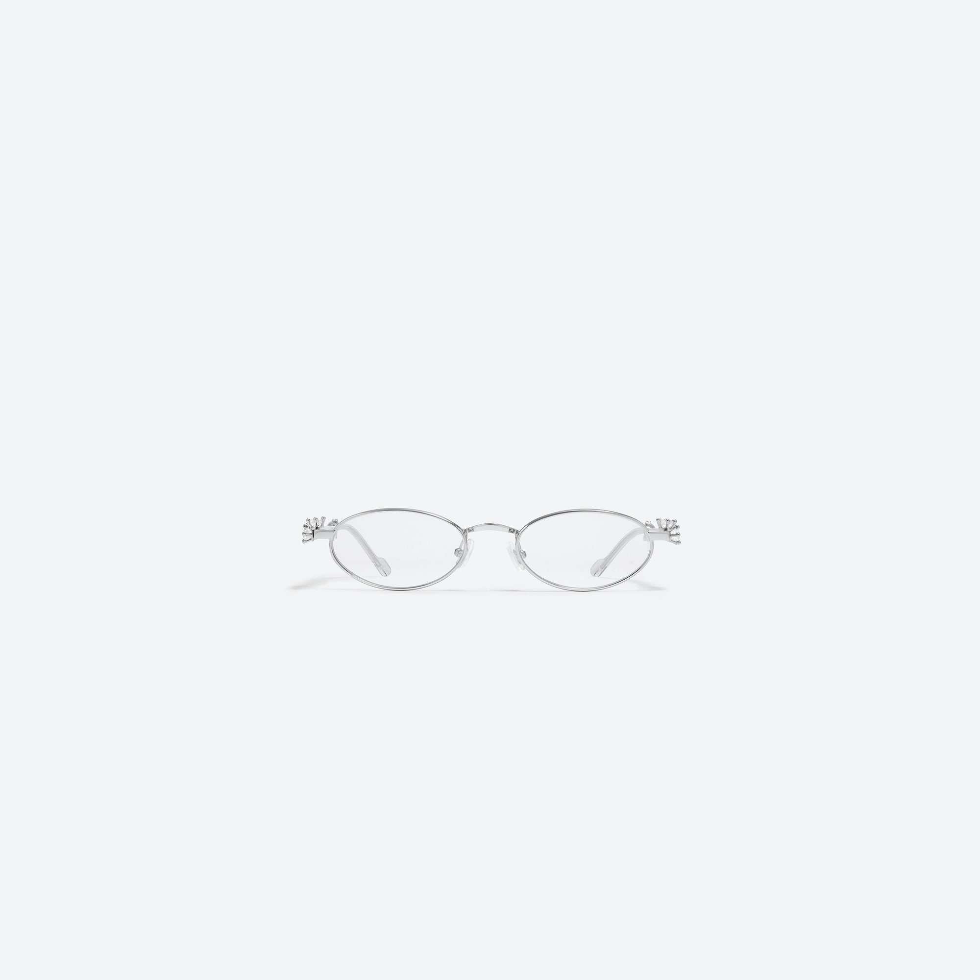 A front view of Gentle Monster D’heygere - Pierced 02 Silver Metal framed Oval sunglasses.