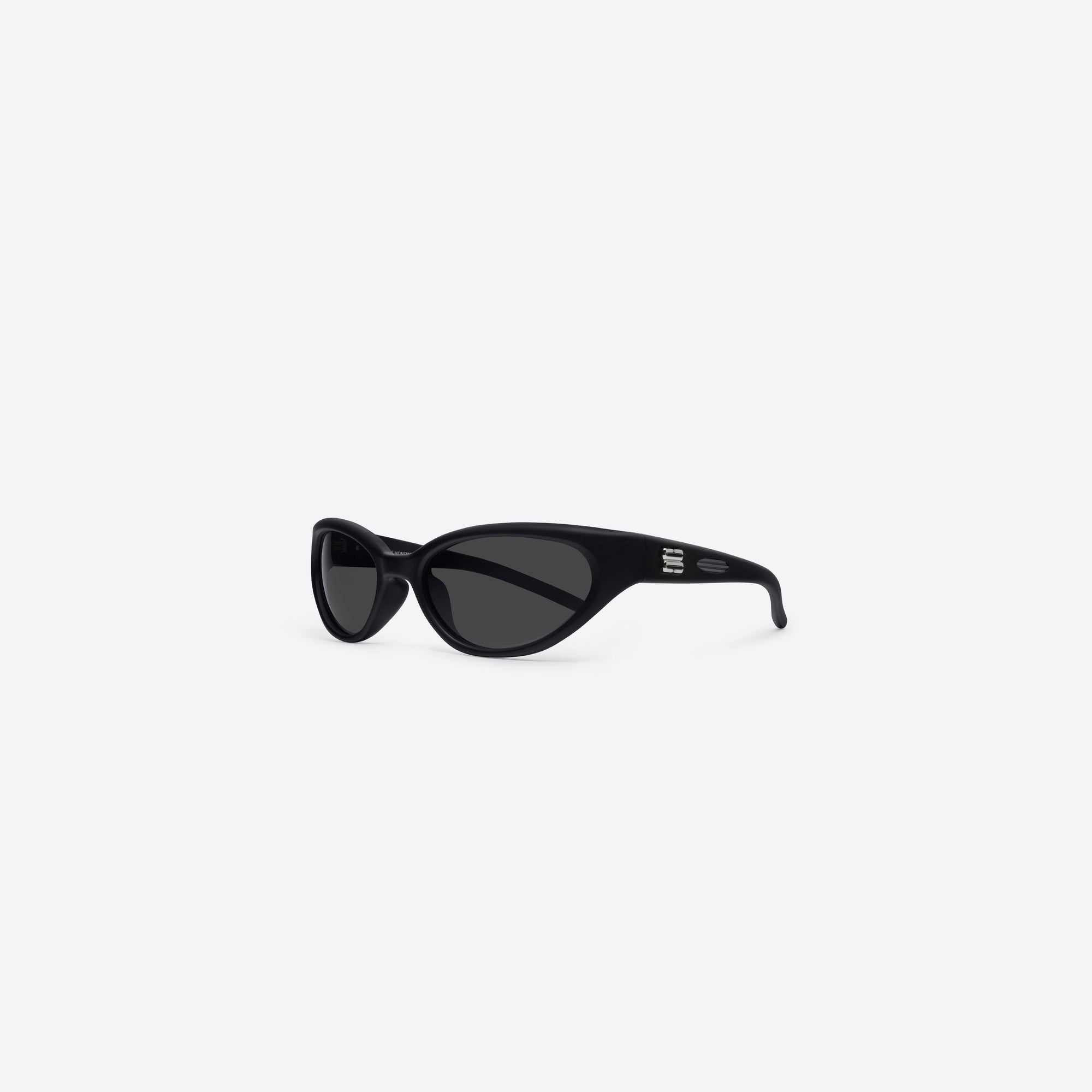 45-degree view of Gentle Monster Juicy 01 Black Nylon framed Wraparound sunglasses.