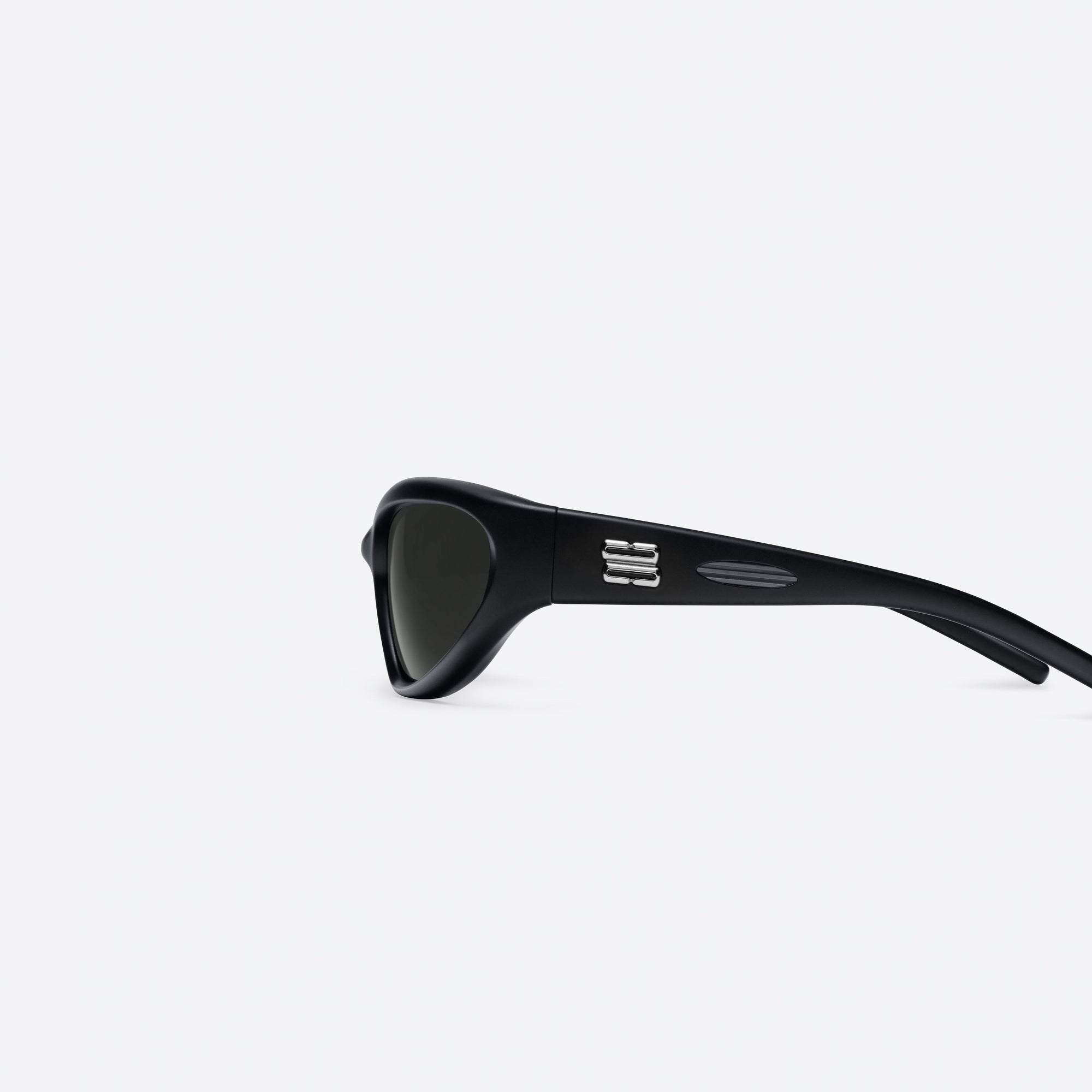 A detailed left view of Gentle Monster Panna Cotta 01 Black Nylon framed Wraparound sunglasses.