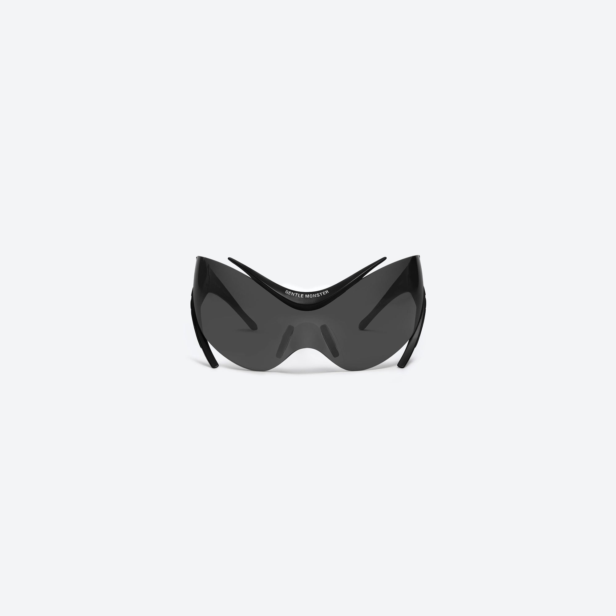 A front view of Gentle Monster Mugler - Spiral 01 M01 Black Nylon framed Wraparound sunglasses.