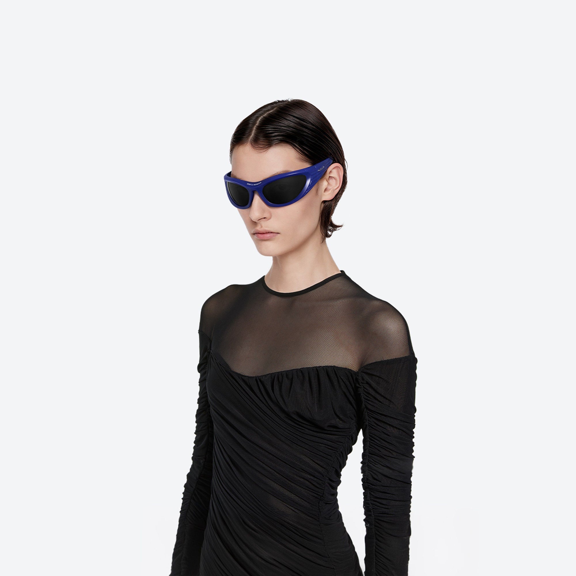Model wearing the Mugler - Spiral 02 V2 Purple Nylon framed Wraparound sunglasses.