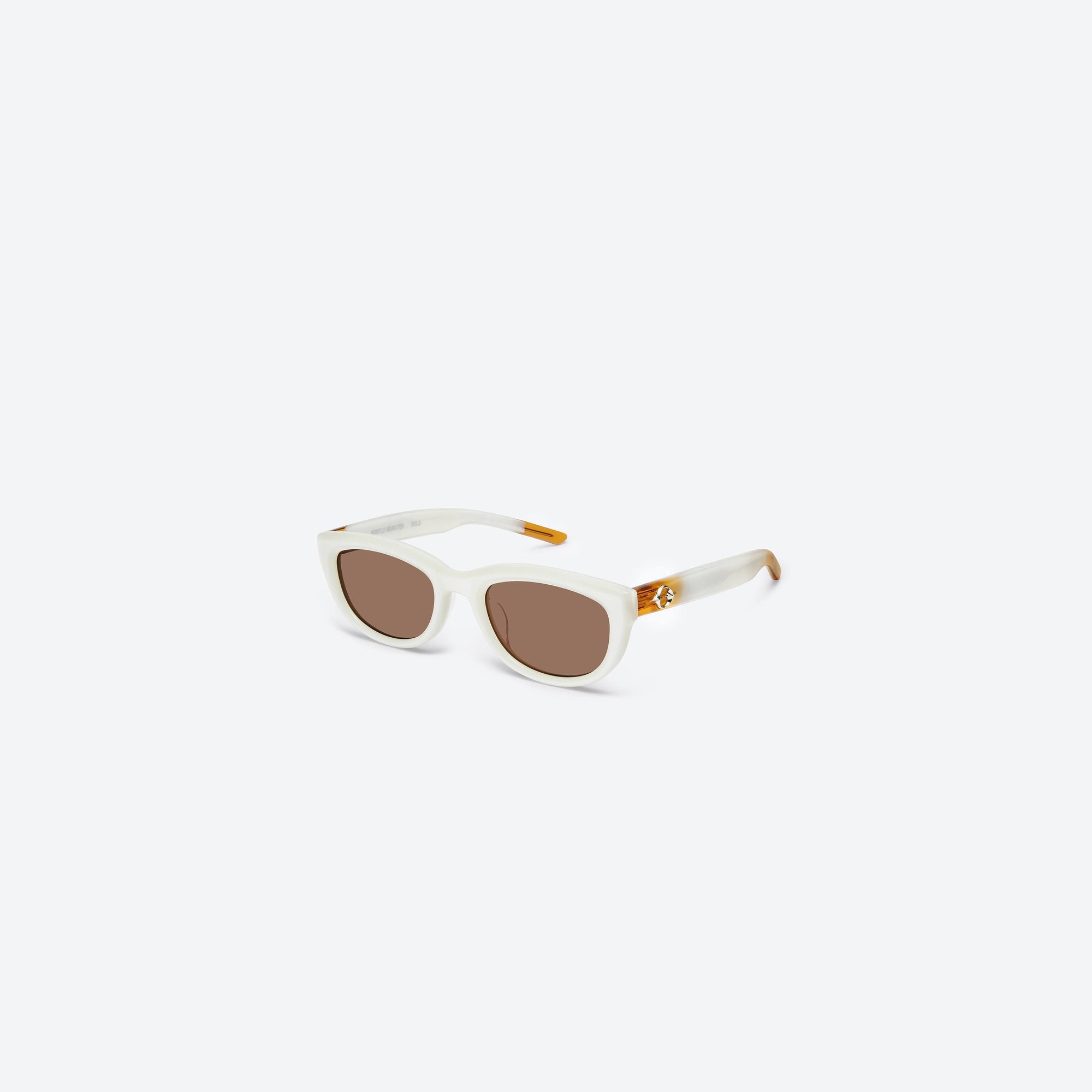45-degree view of Gentle Monster Monochrome WC6 Ivory Acetate framed Round sunglasses.