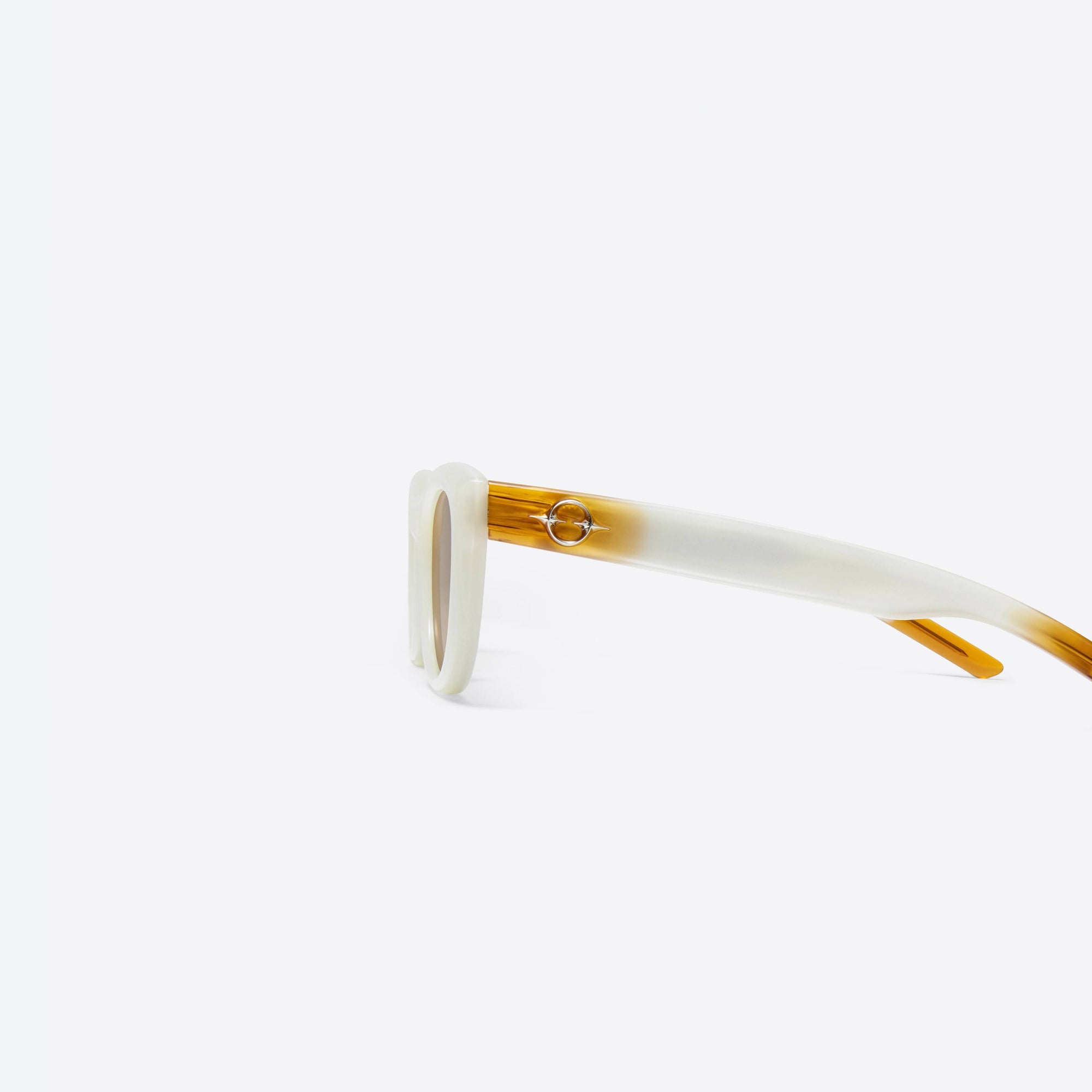 A detailed left view of Gentle Monster Monochrome WC6 Ivory Acetate framed Round sunglasses.