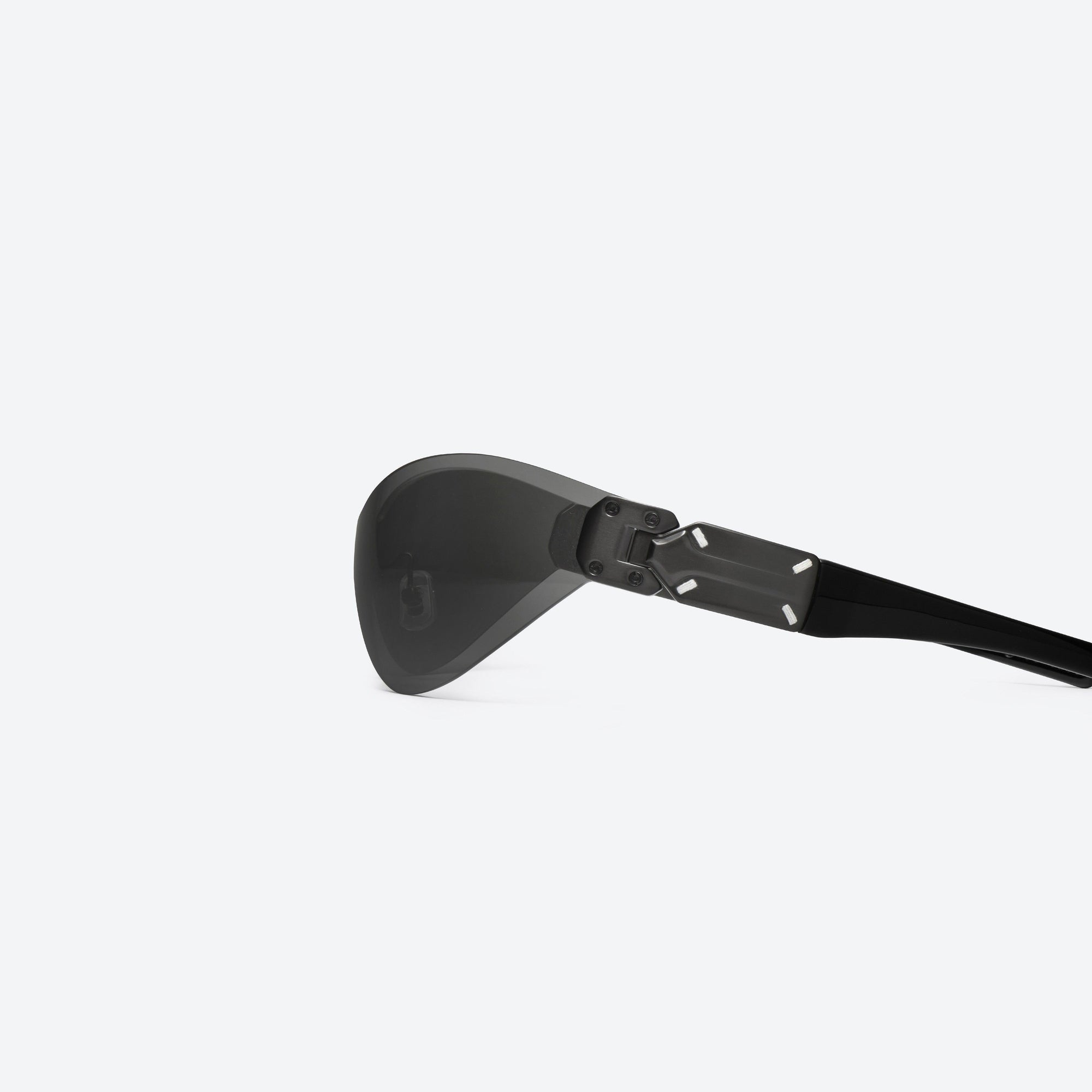 A detailed left view of Gentle Monster Maison Margiela - MM103 01 Gray Mixed framed Wraparound sunglasses.