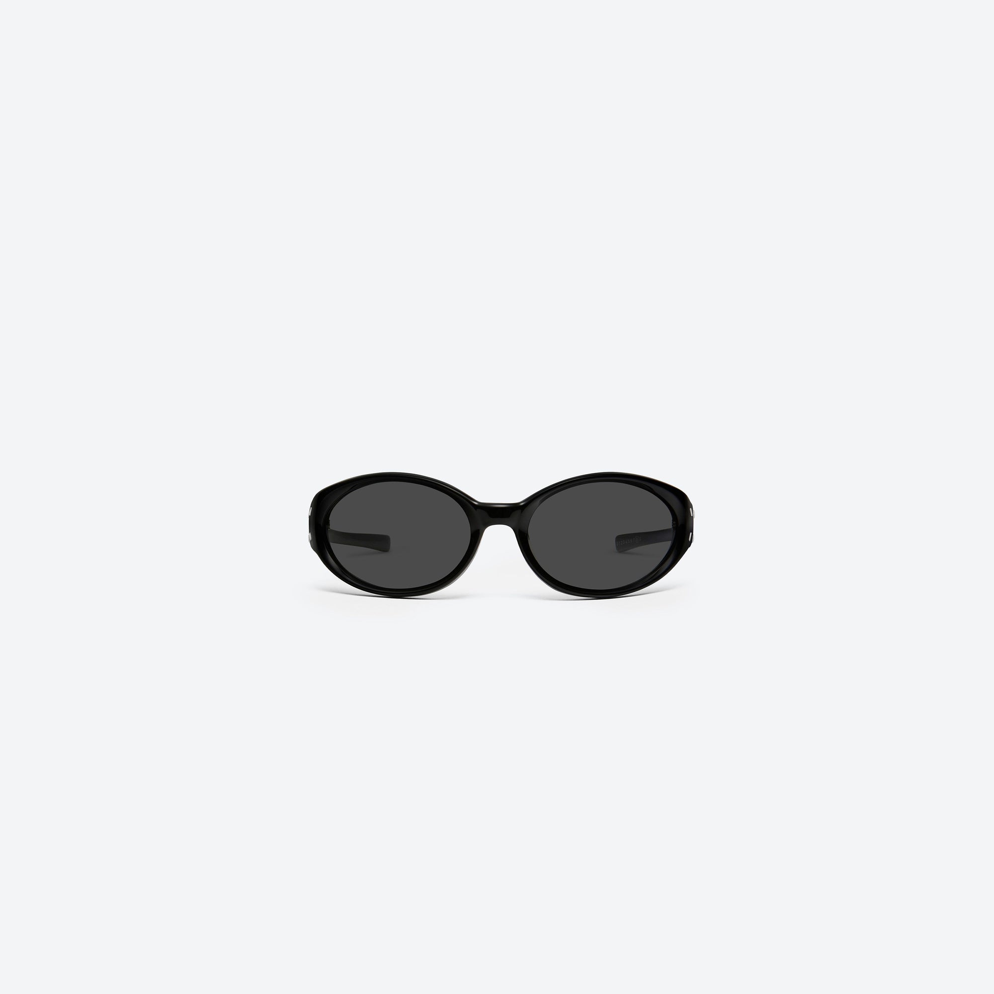 A front view of Gentle Monster Maison Margiela - MM104 01 Black Acetate framed Wraparound sunglasses.