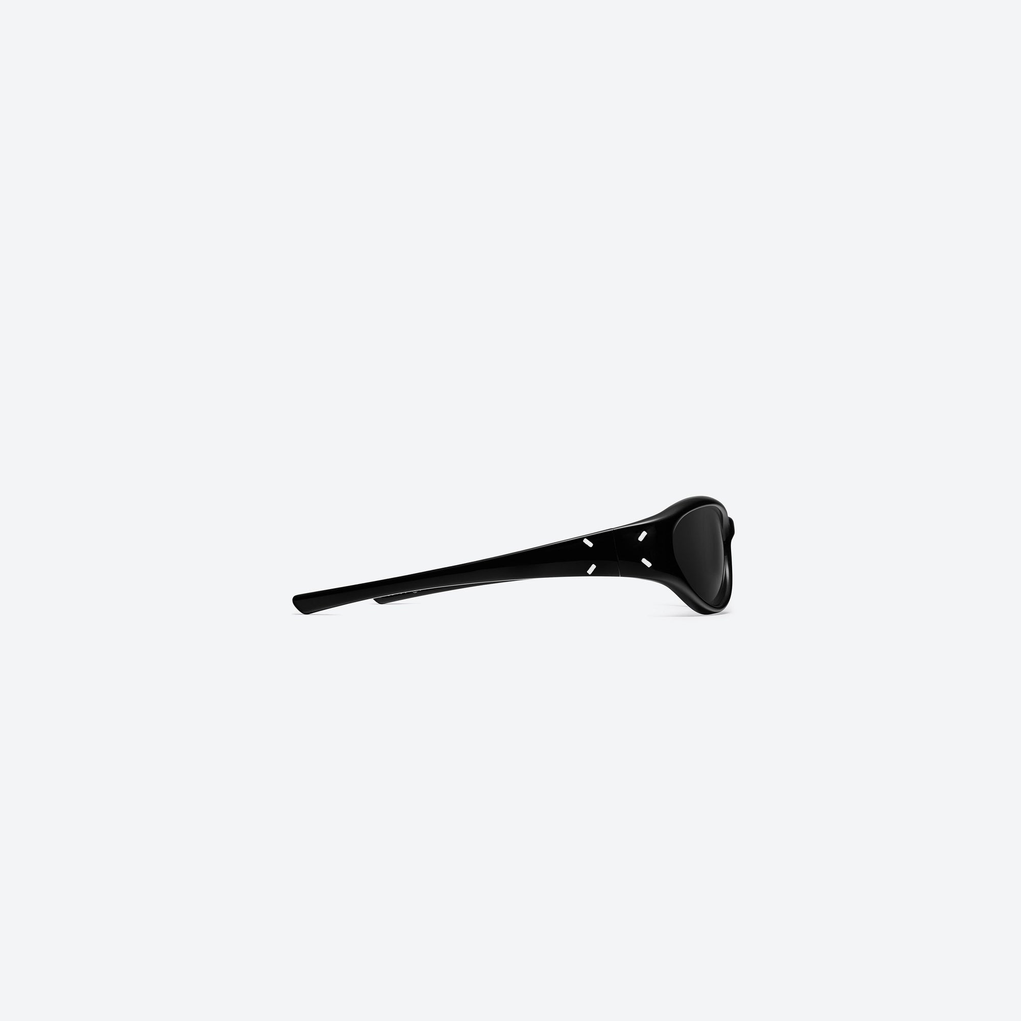A detailed right view of Gentle Monster Maison Margiela - MM105 01 Black Acetate framed Wraparound sunglasses.
