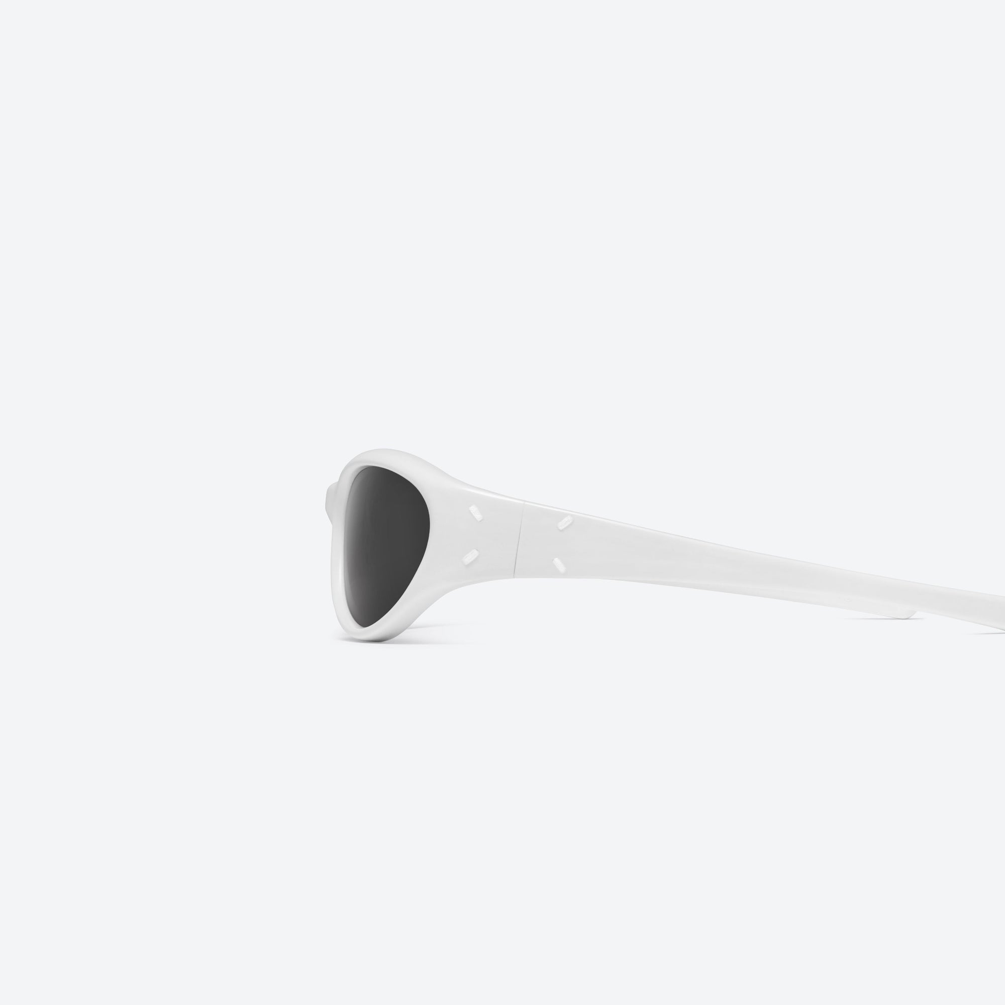 A detailed left view of Gentle Monster Maison Margiela - MM105 W2 White Acetate framed Wraparound sunglasses.