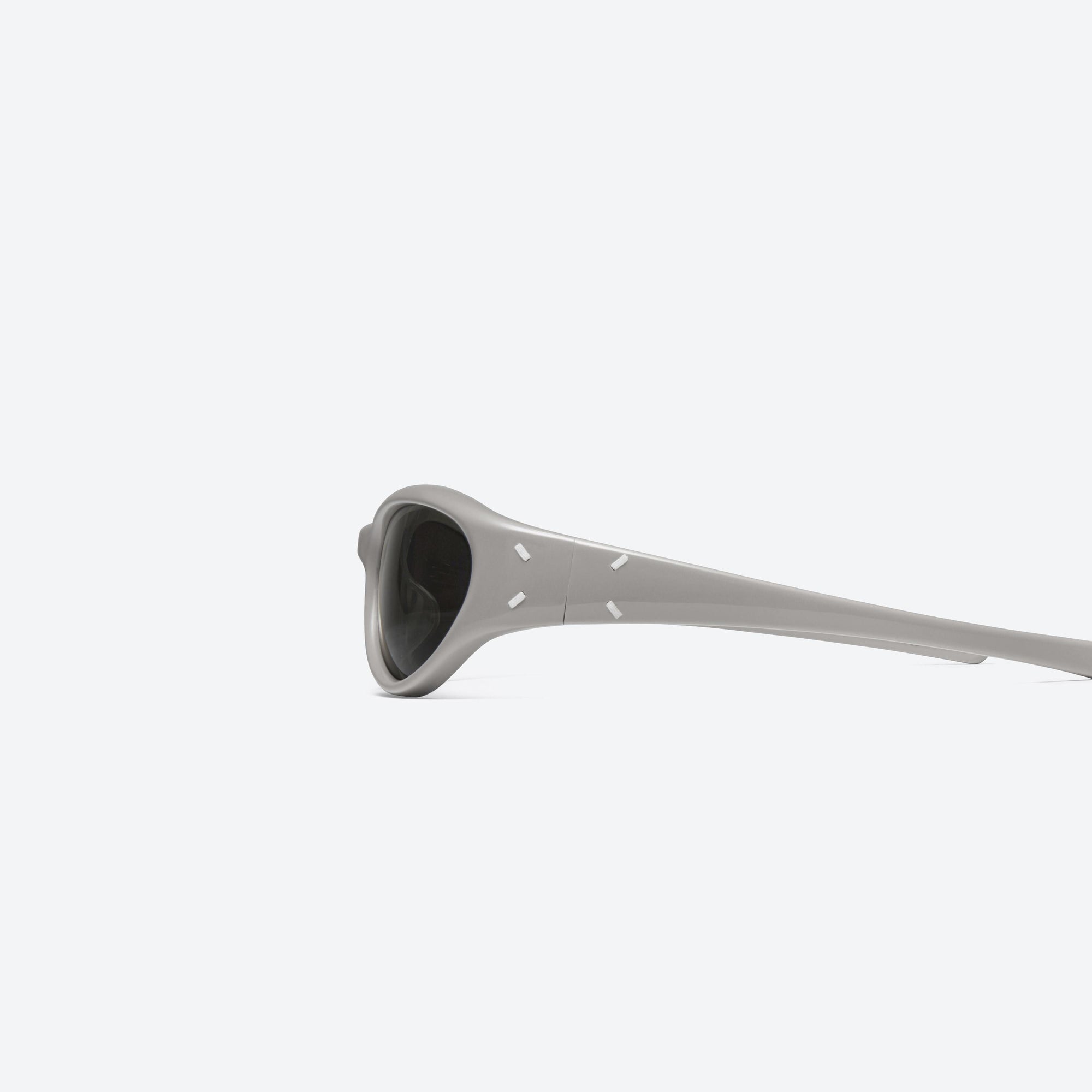 A detailed left view of Gentle Monster Maison Margiela - MM105 G10 Gray Acetate framed Wraparound sunglasses.