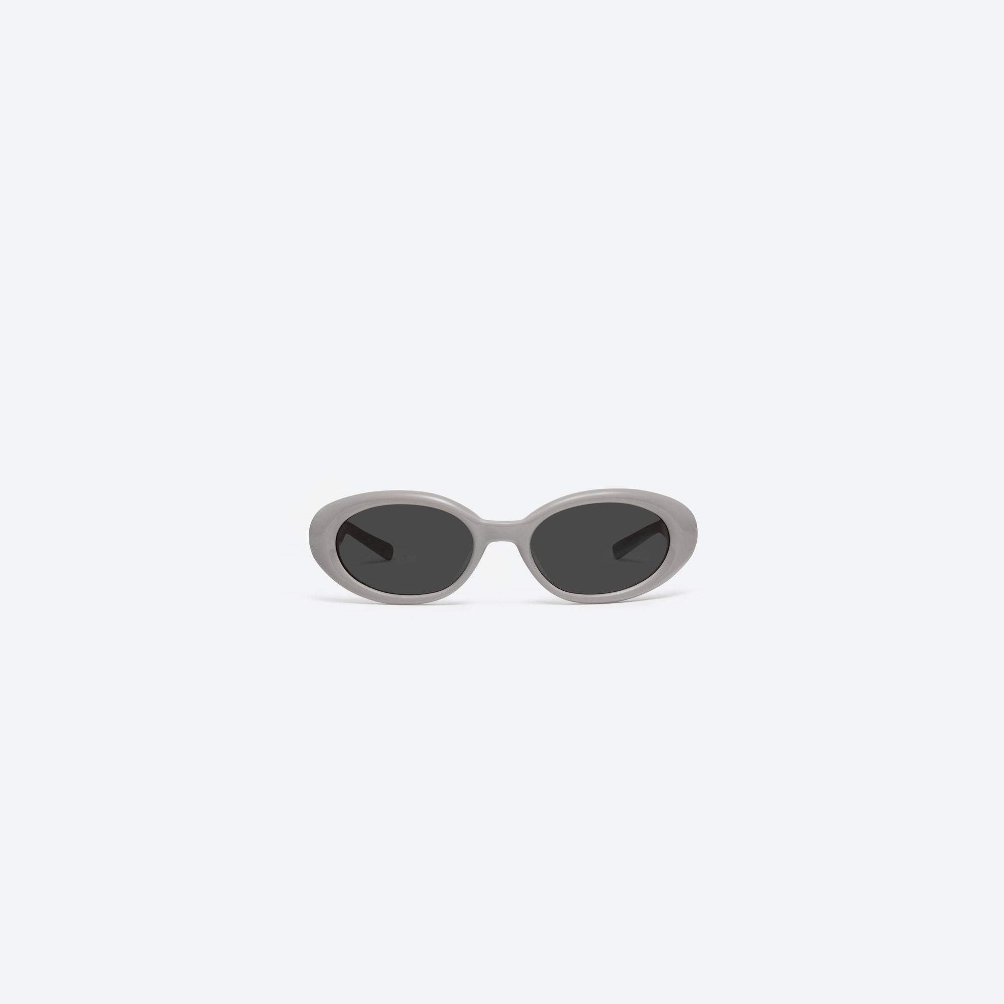 A front view of Gentle Monster Maison Margiela - MM107 G10 Gray Acetate framed Oval sunglasses.
