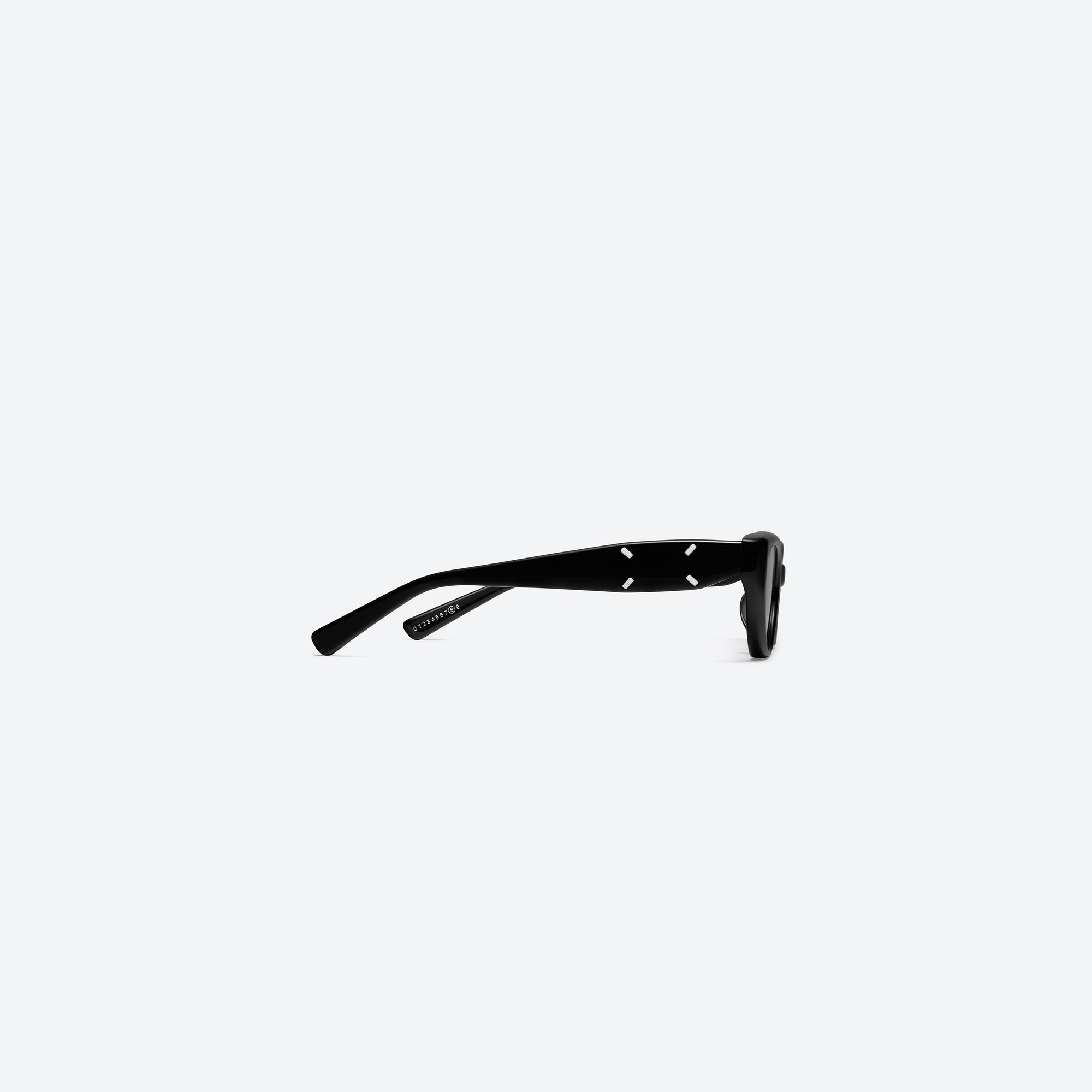 A detailed right view of Gentle Monster Maison Margiela - MM108 01 Black Acetate framed Cat-eye sunglasses.