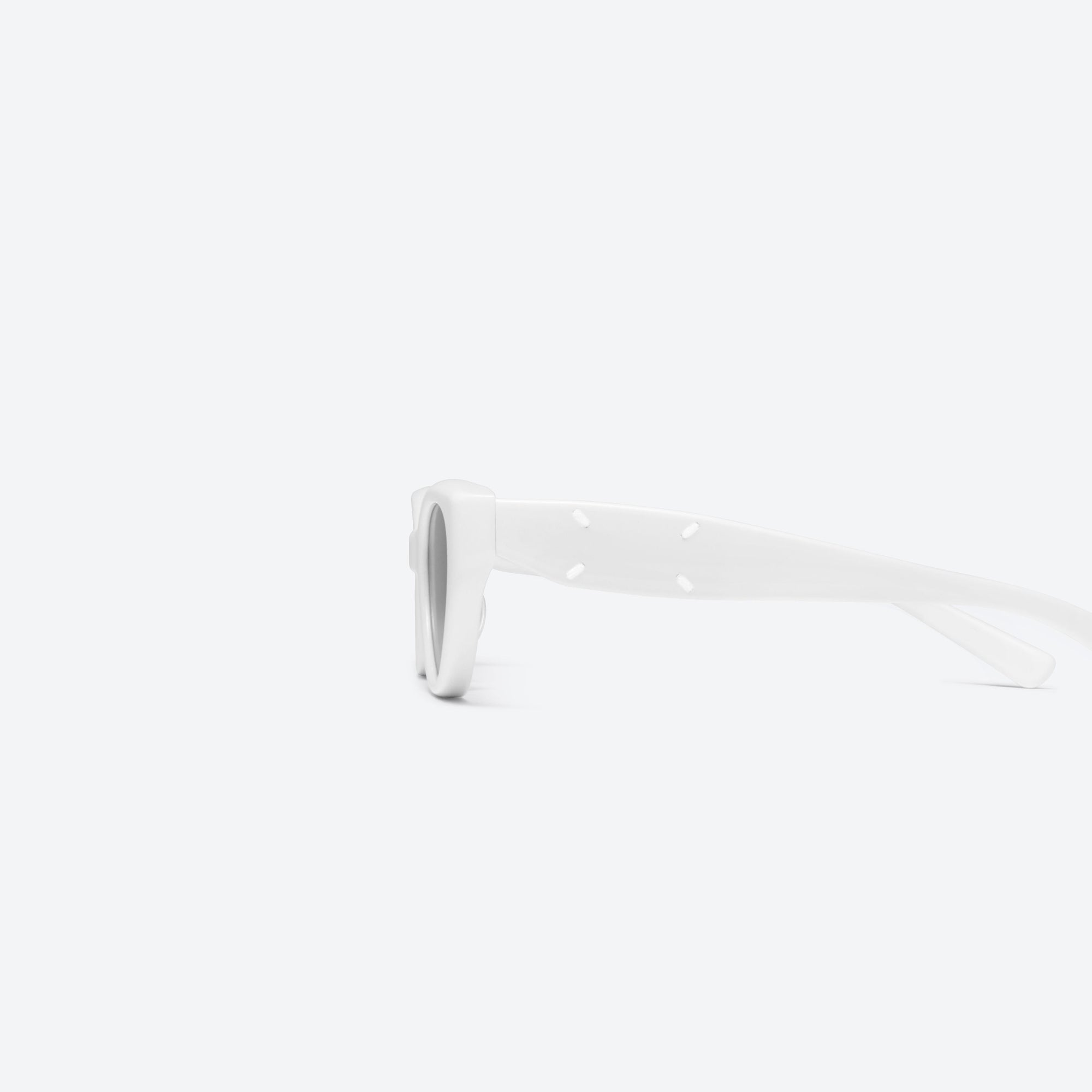 A detailed left view of Gentle Monster Maison Margiela - MM108 W2 White Acetate framed Cat-eye sunglasses.