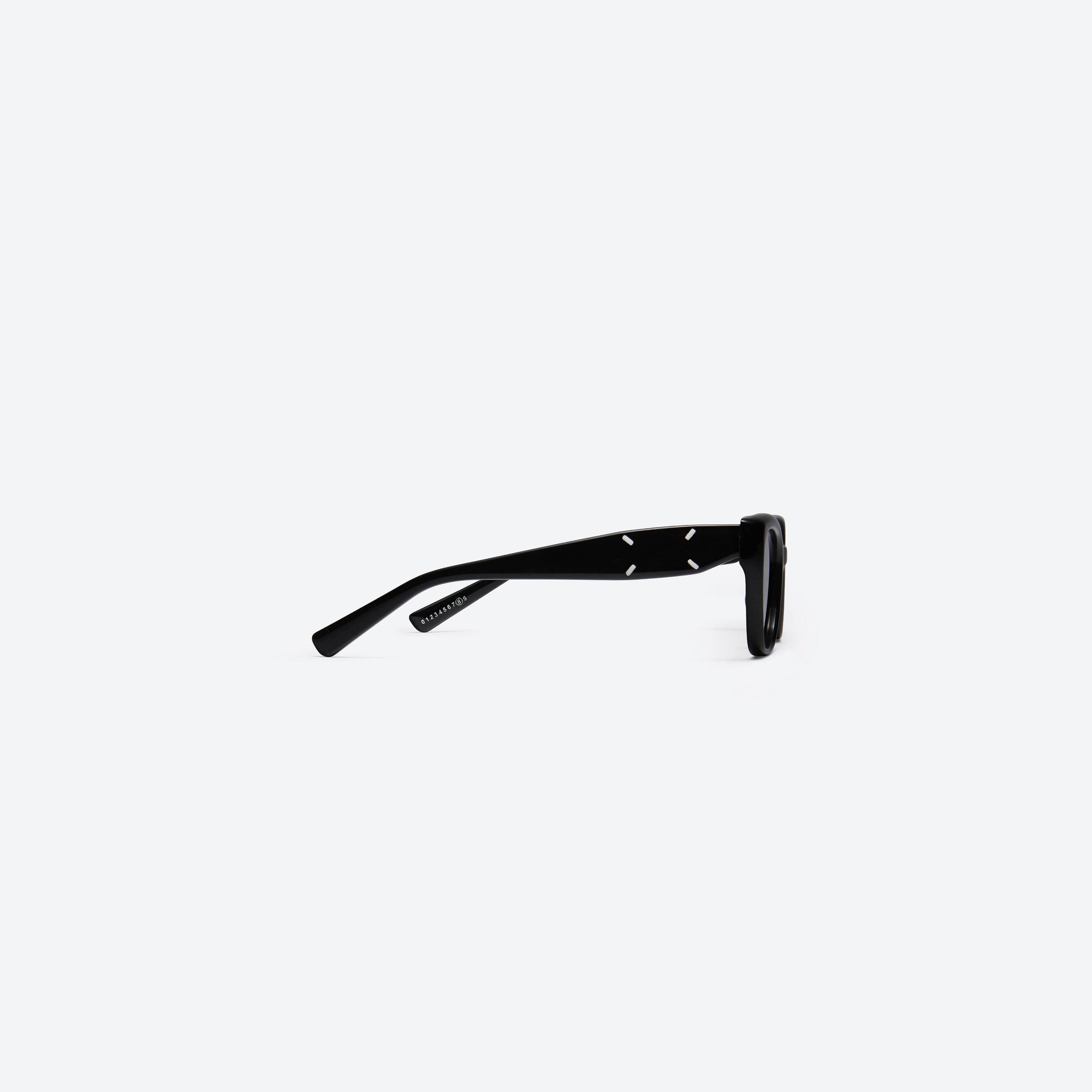 A detailed right view of Gentle Monster Maison Margiela - MM109 01 Black Acetate framed Square sunglasses.