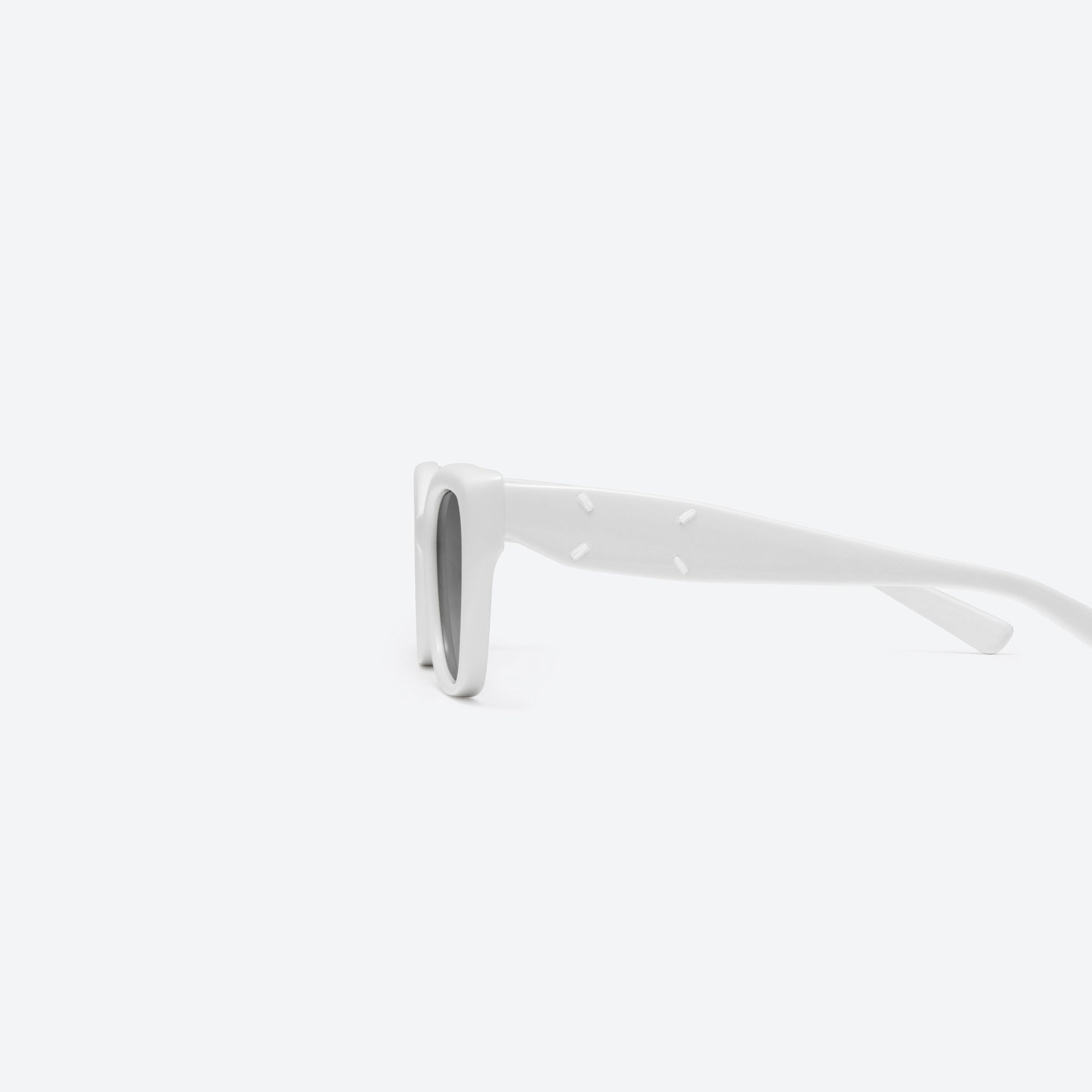 A detailed left view of Gentle Monster Maison Margiela - MM109 W2 White Acetate framed Square sunglasses.