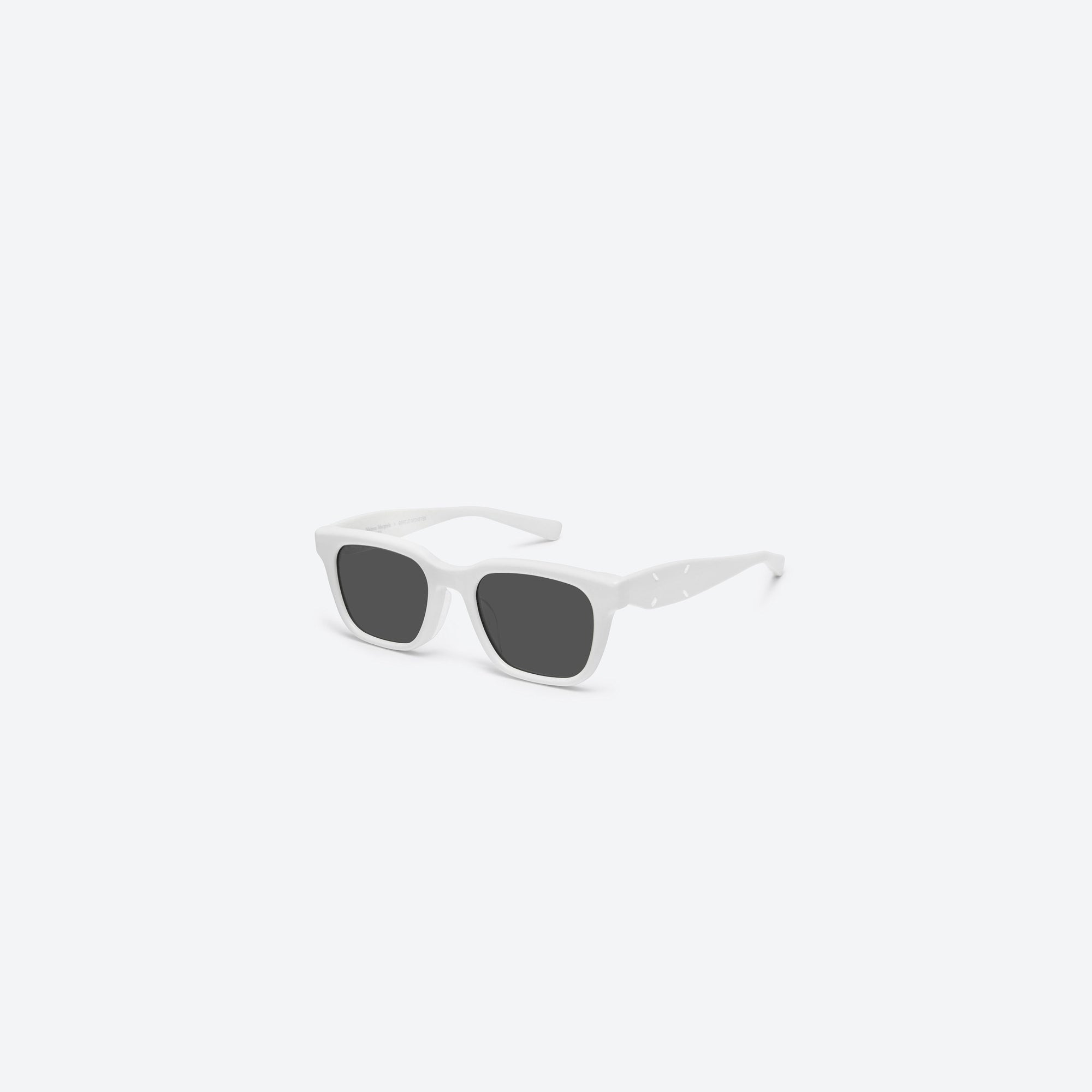 45-degree view of Gentle Monster Maison Margiela - MM110 W2 White Acetate framed Square sunglasses.