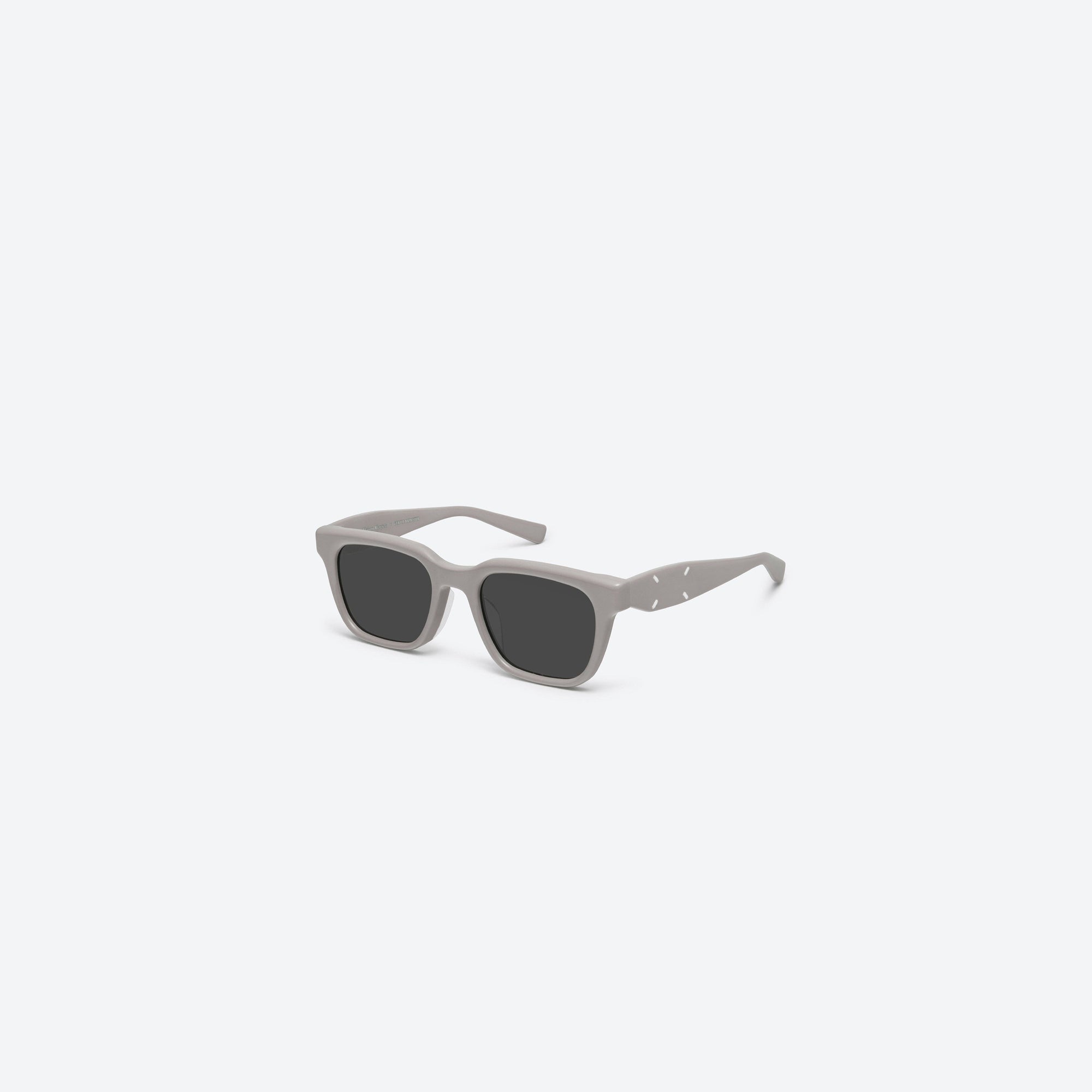 45-degree view of Gentle Monster Maison Margiela - MM110 G10 Gray Acetate framed Square sunglasses.