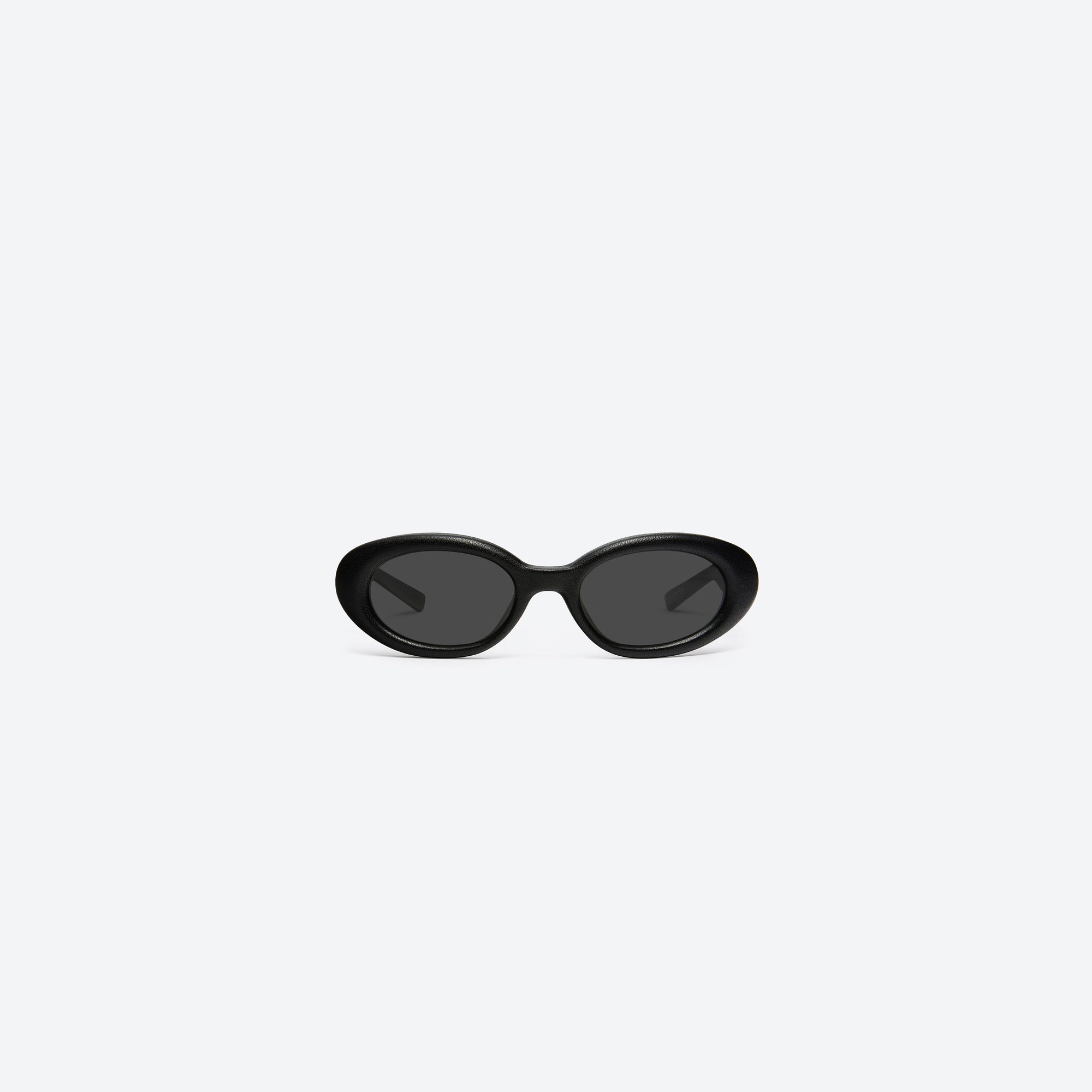 A front view of Gentle Monster Maison Margiela - MM107 Leather L01 Black Acetate framed Oval sunglasses.