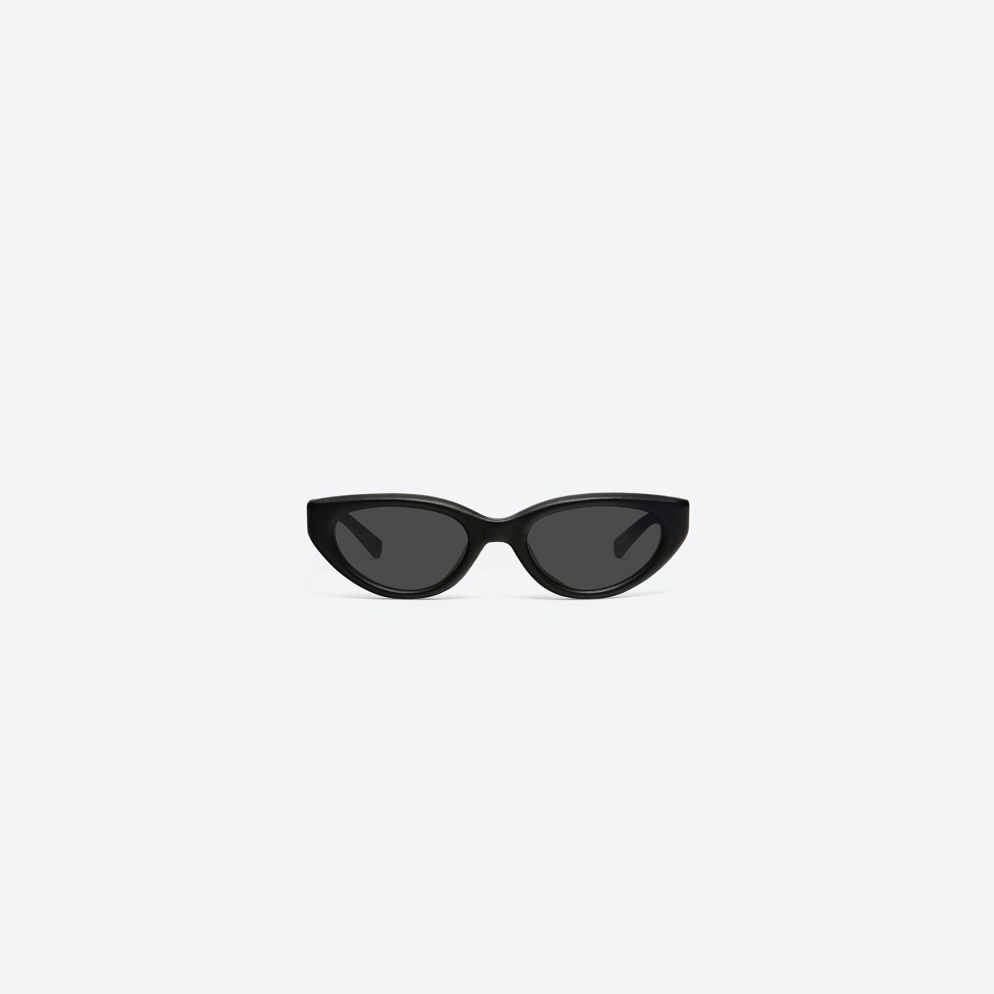 A front view of Gentle Monster Maison Margiela - MM108 Leather L01 Black Acetate framed Cat-eye sunglasses.