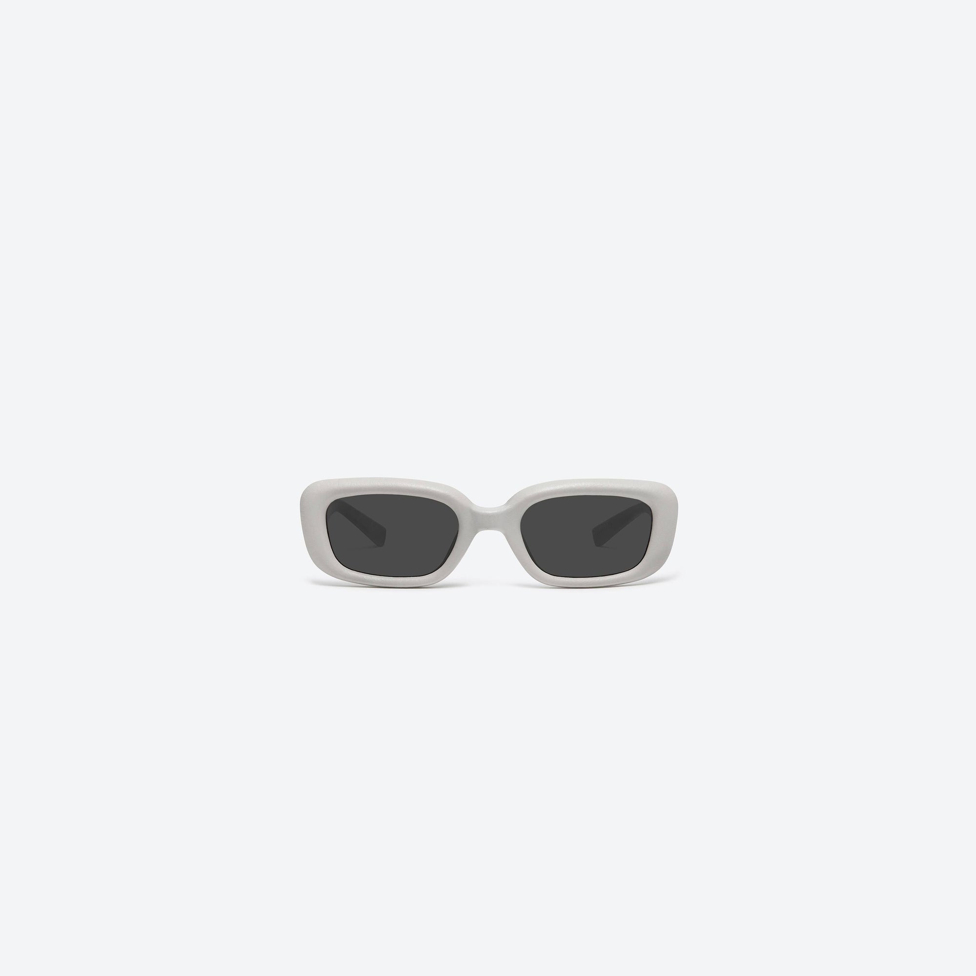 A front view of Gentle Monster Maison Margiela - MM106 Leather LIV1 Ivory Acetate framed Square sunglasses.
