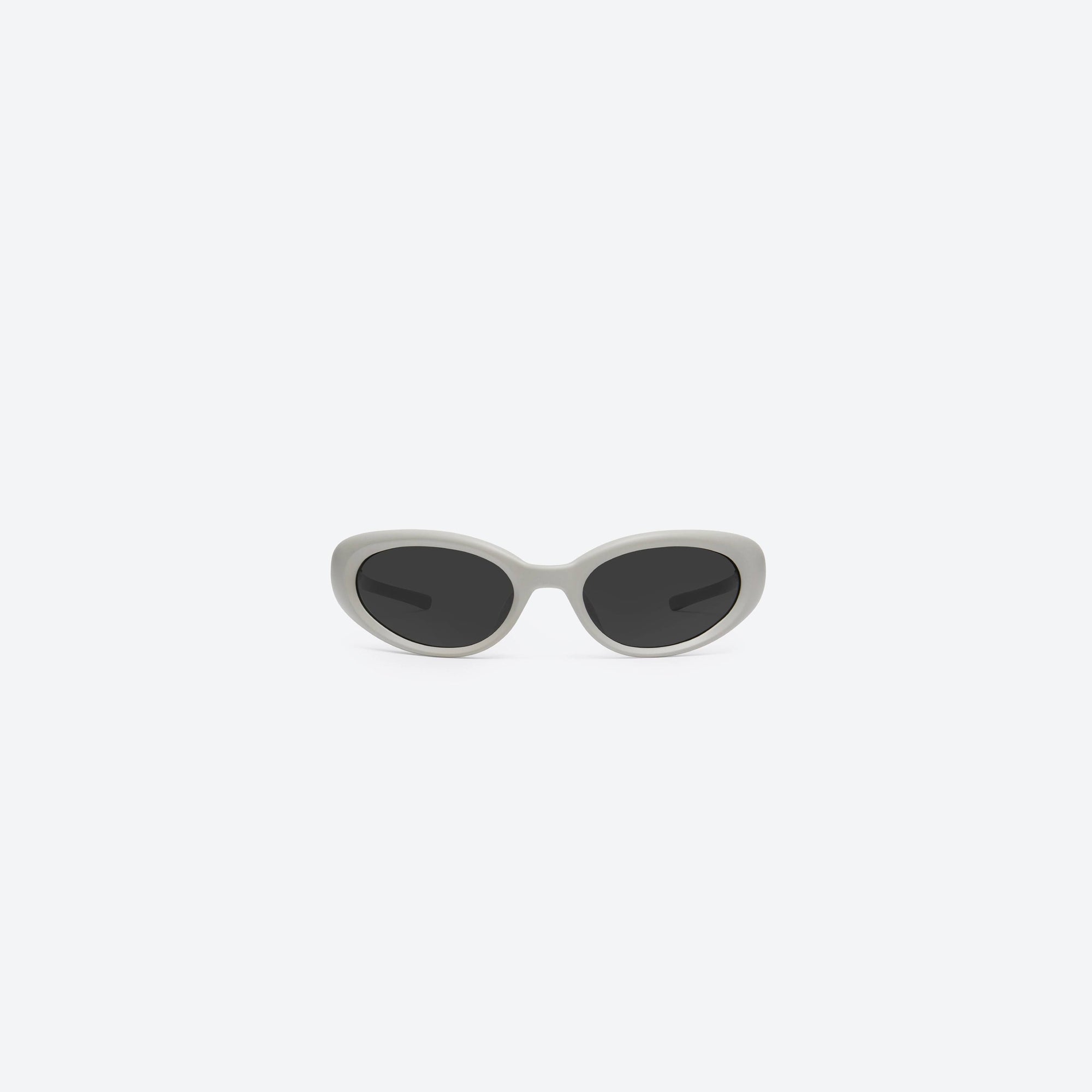 A front view of Gentle Monster Gelati G12 Gray Nylon framed Wraparound sunglasses.