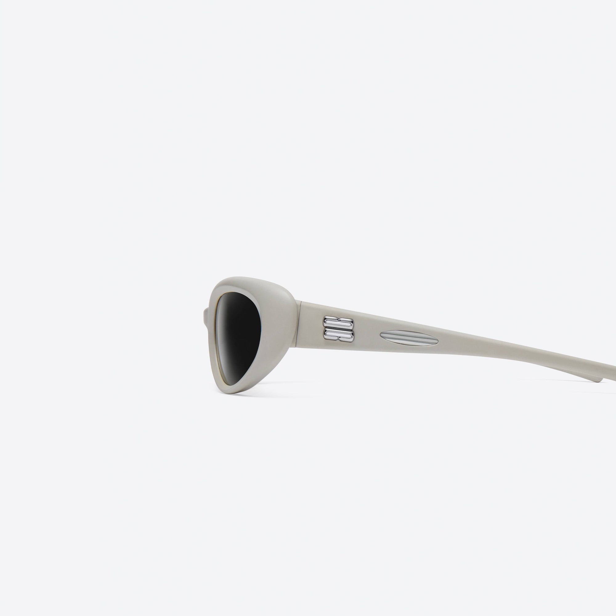 A detailed left view of Gentle Monster Gelati G12 Gray Nylon framed Wraparound sunglasses.