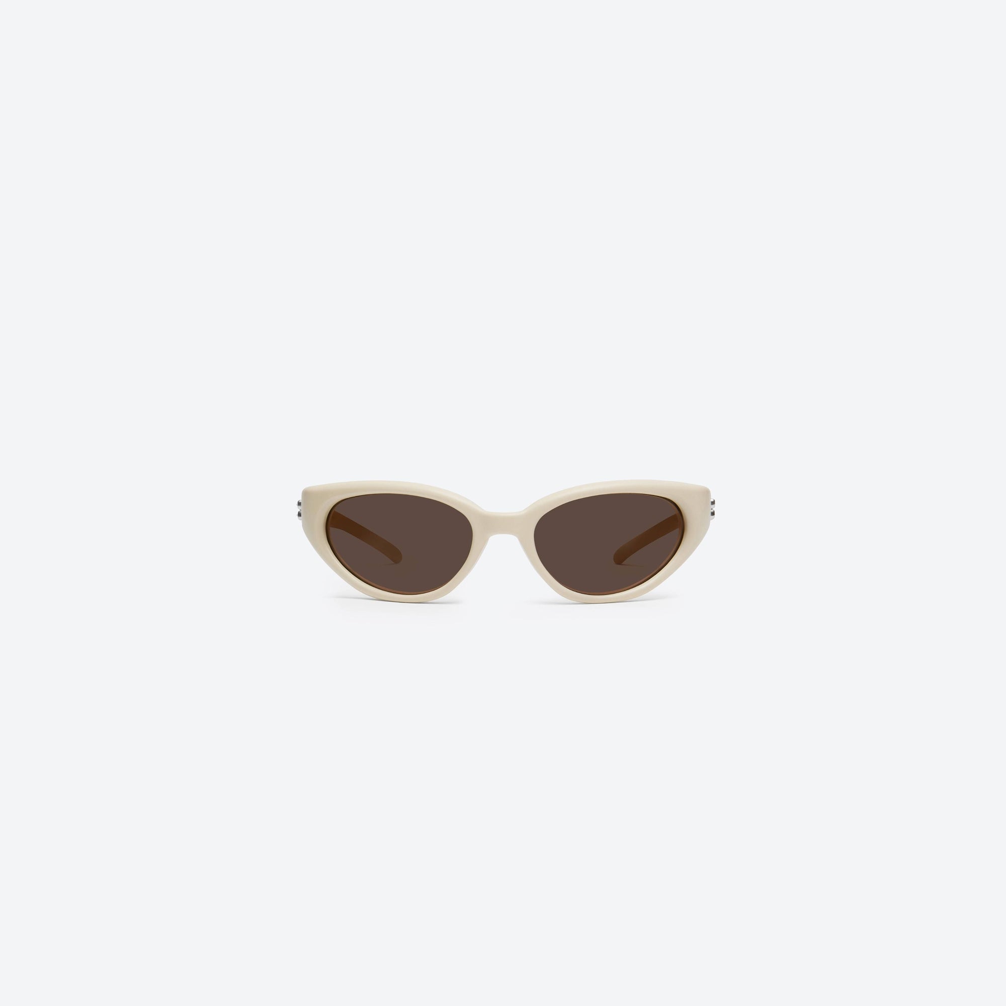 A front view of Gentle Monster Juicy IV2 Ivory Nylon framed Wraparound sunglasses.