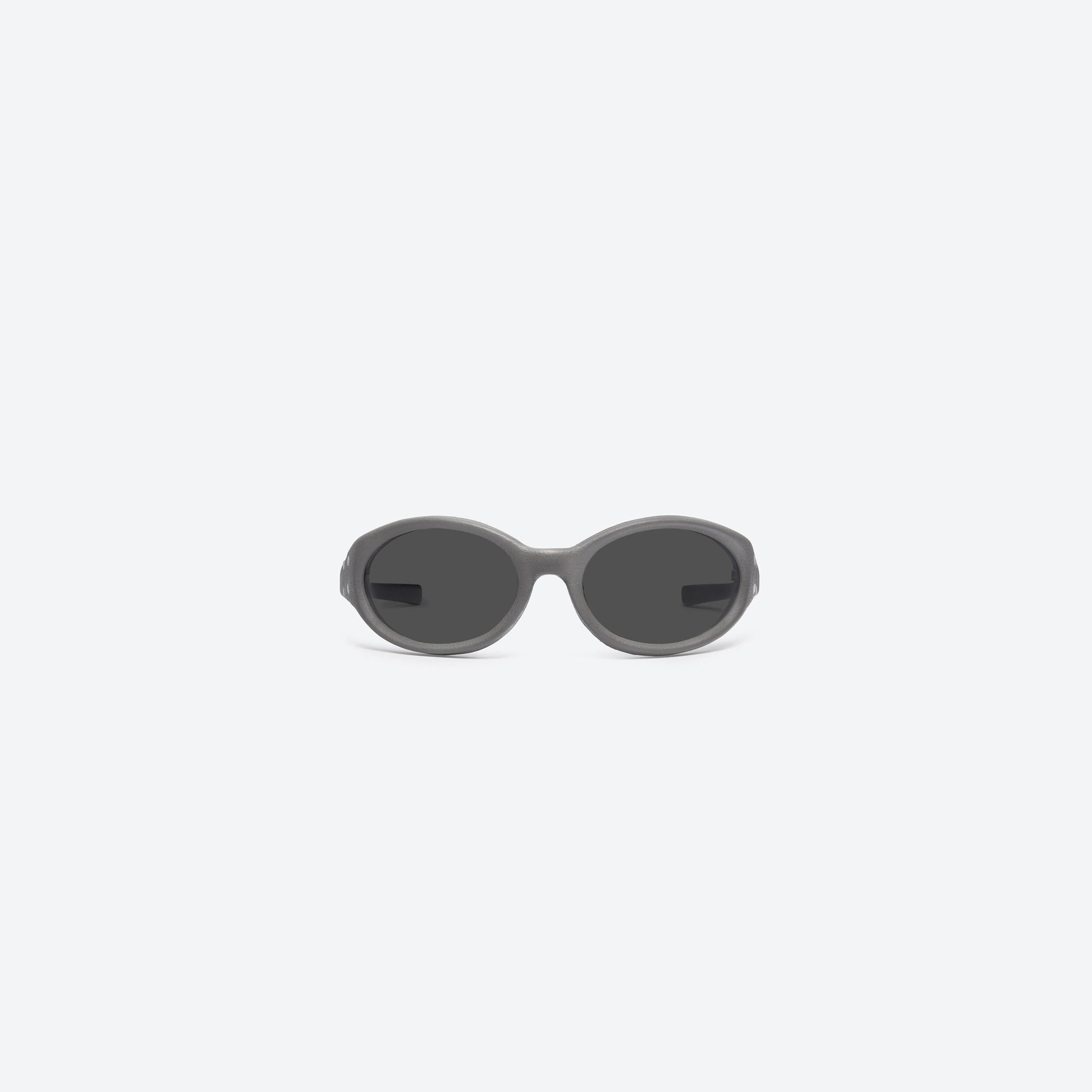 A front view of Gentle Monster Maison Margiela - MM104 Leather LK1 Green Acetate framed Wraparound sunglasses.