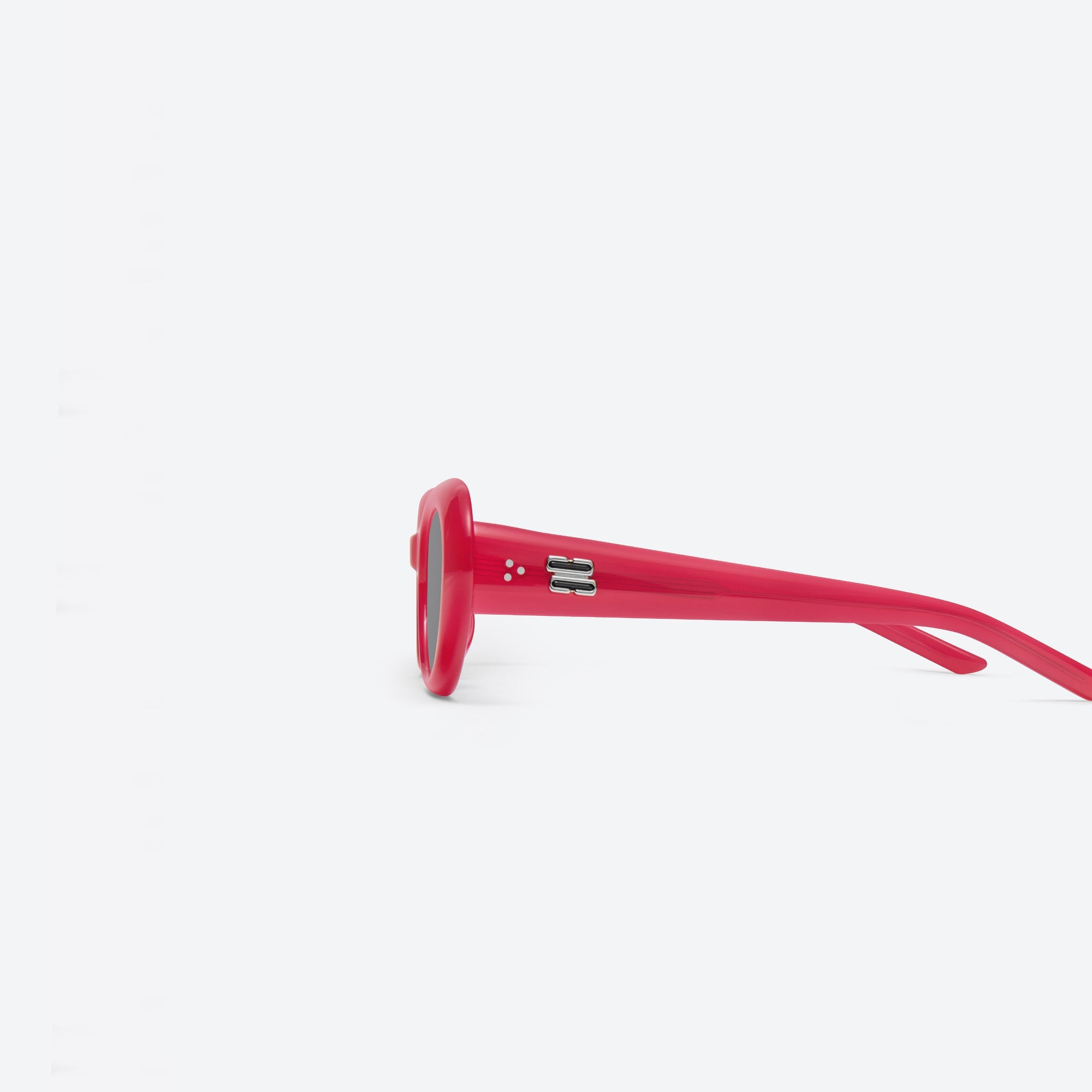 A detailed left view of Gentle Monster Avon RC6 Red Acetate framed Oval sunglasses.